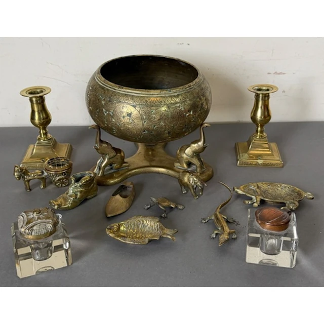 A selection of brass and glass Inkwells, brass bowl on a tri...