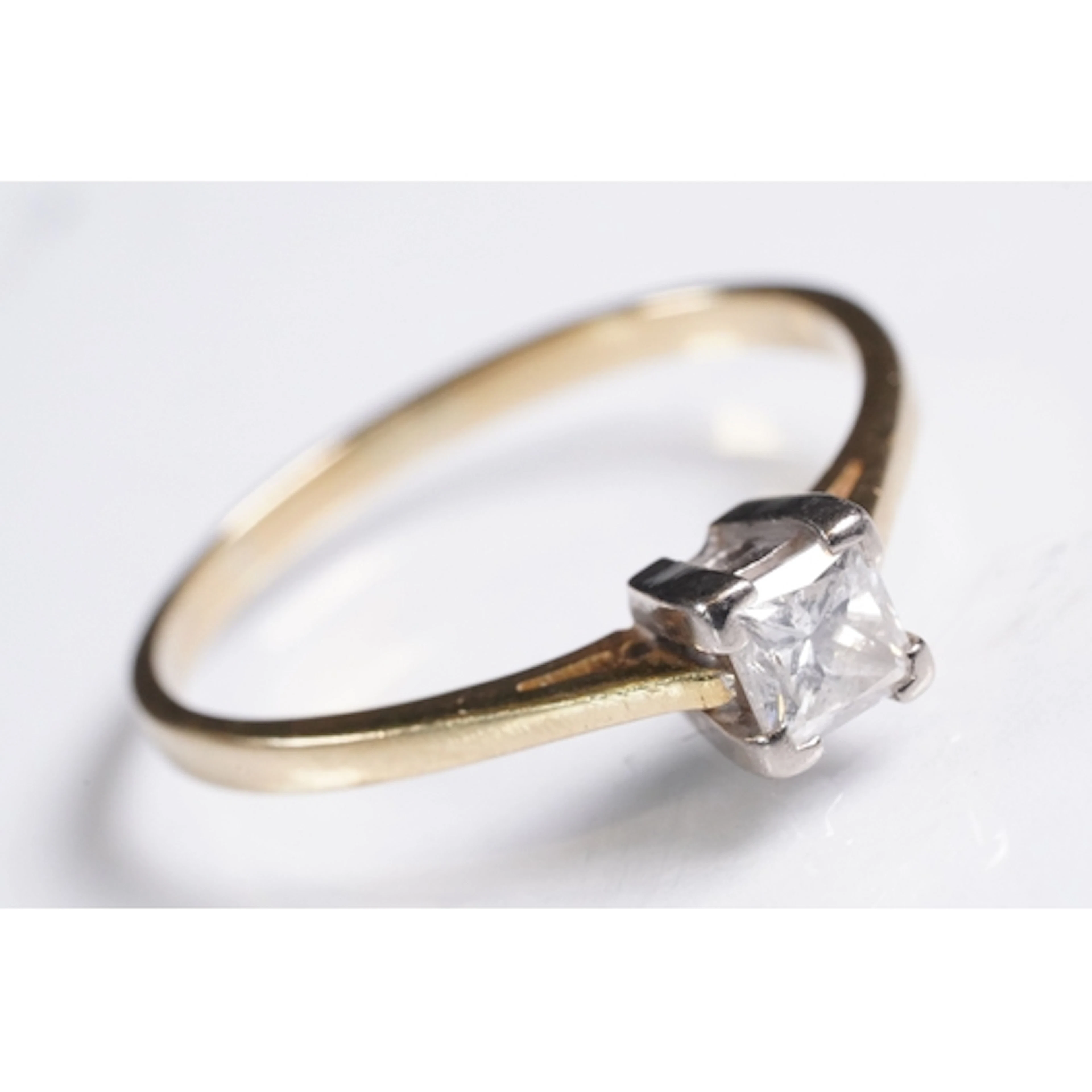 18ct gold and diamond solitaire ring. The ring being set wit...