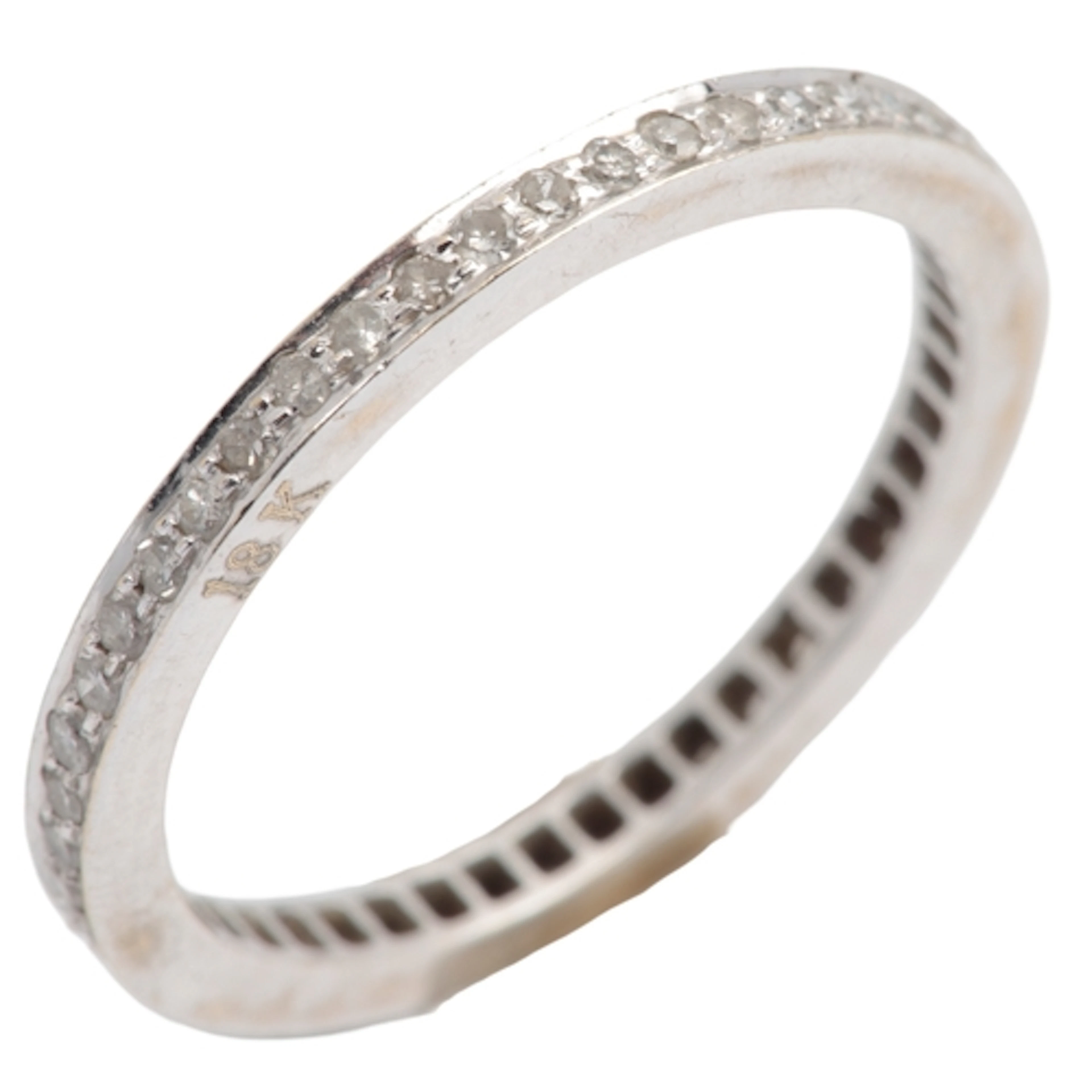 A diamond eternity ring, set with a continuous line of singl...