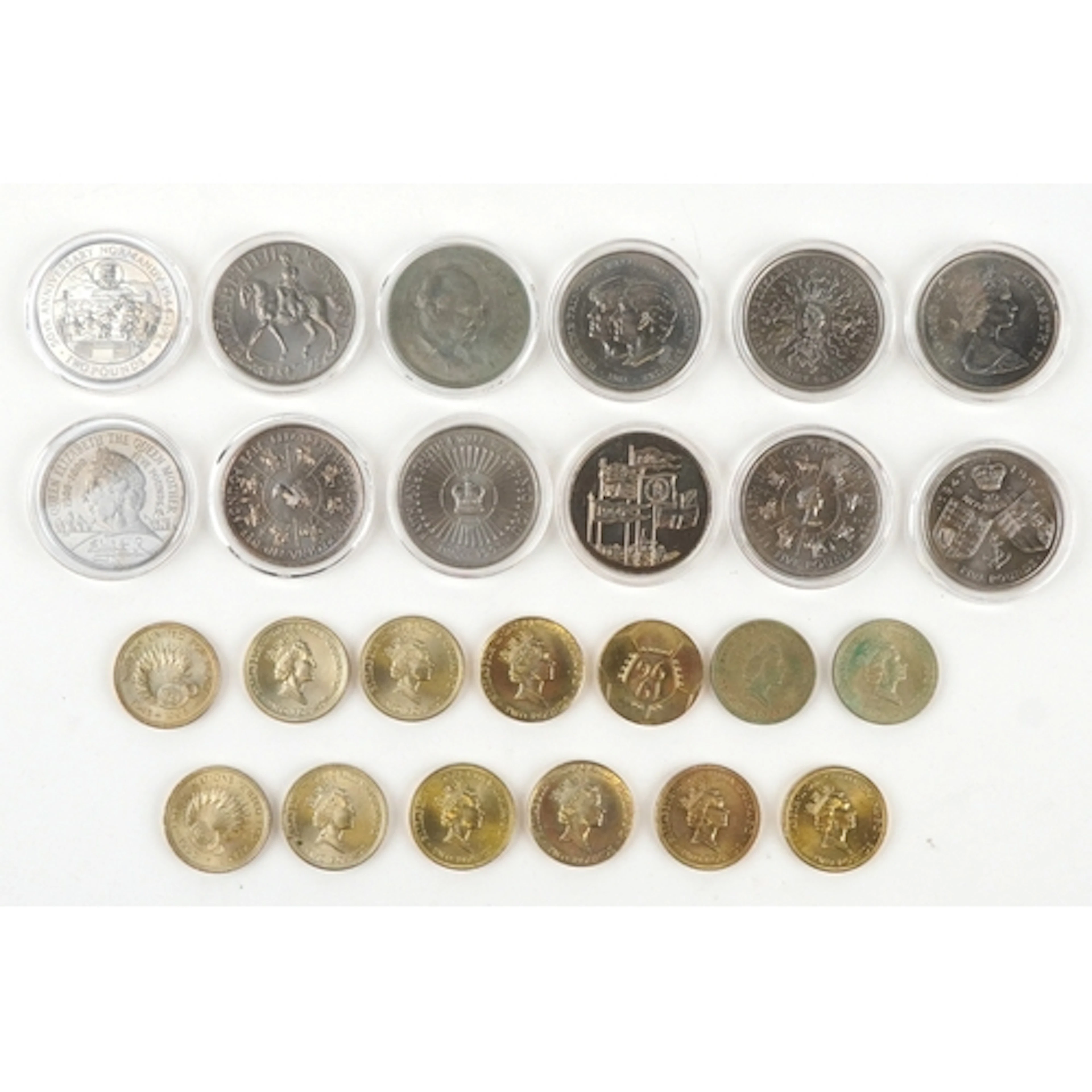Five British five pound coins, thirteen solid brass two poun...