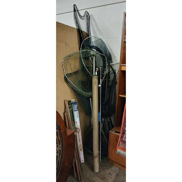 Collection of fishing nets and hooks.
