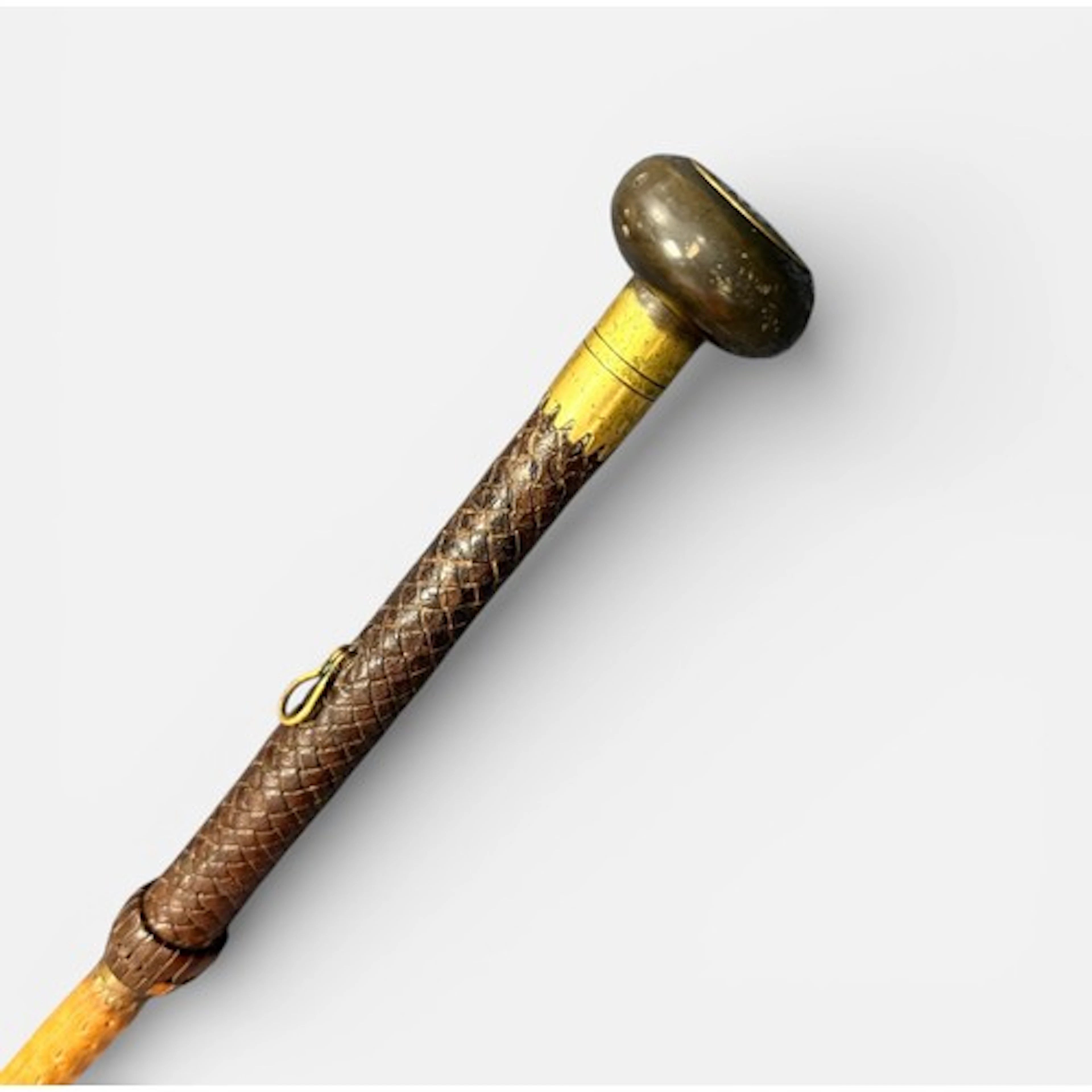 A 19th century European spike stick, having plaited leather ...