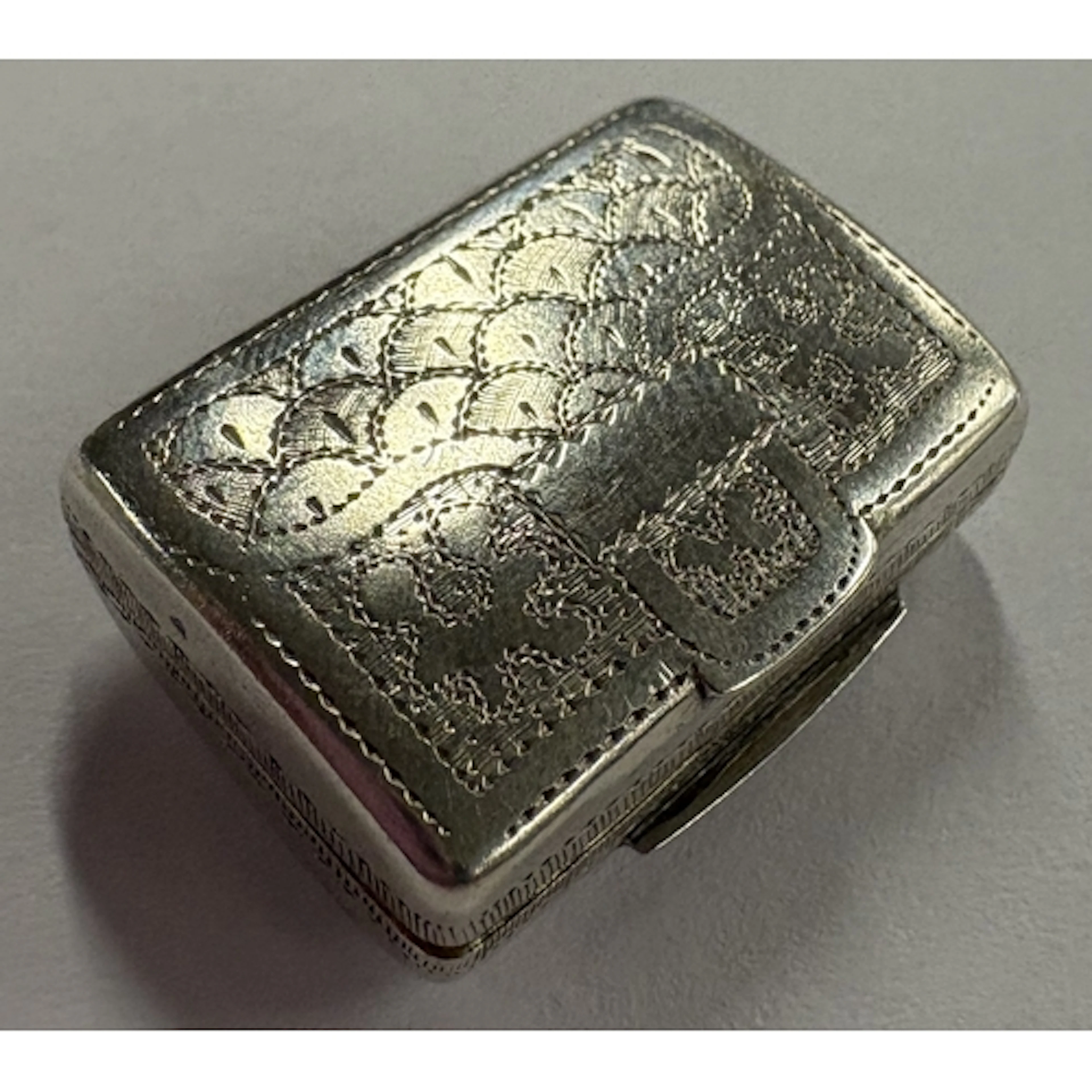 A George III silver vinaigrette in the form of a purse. Birm...