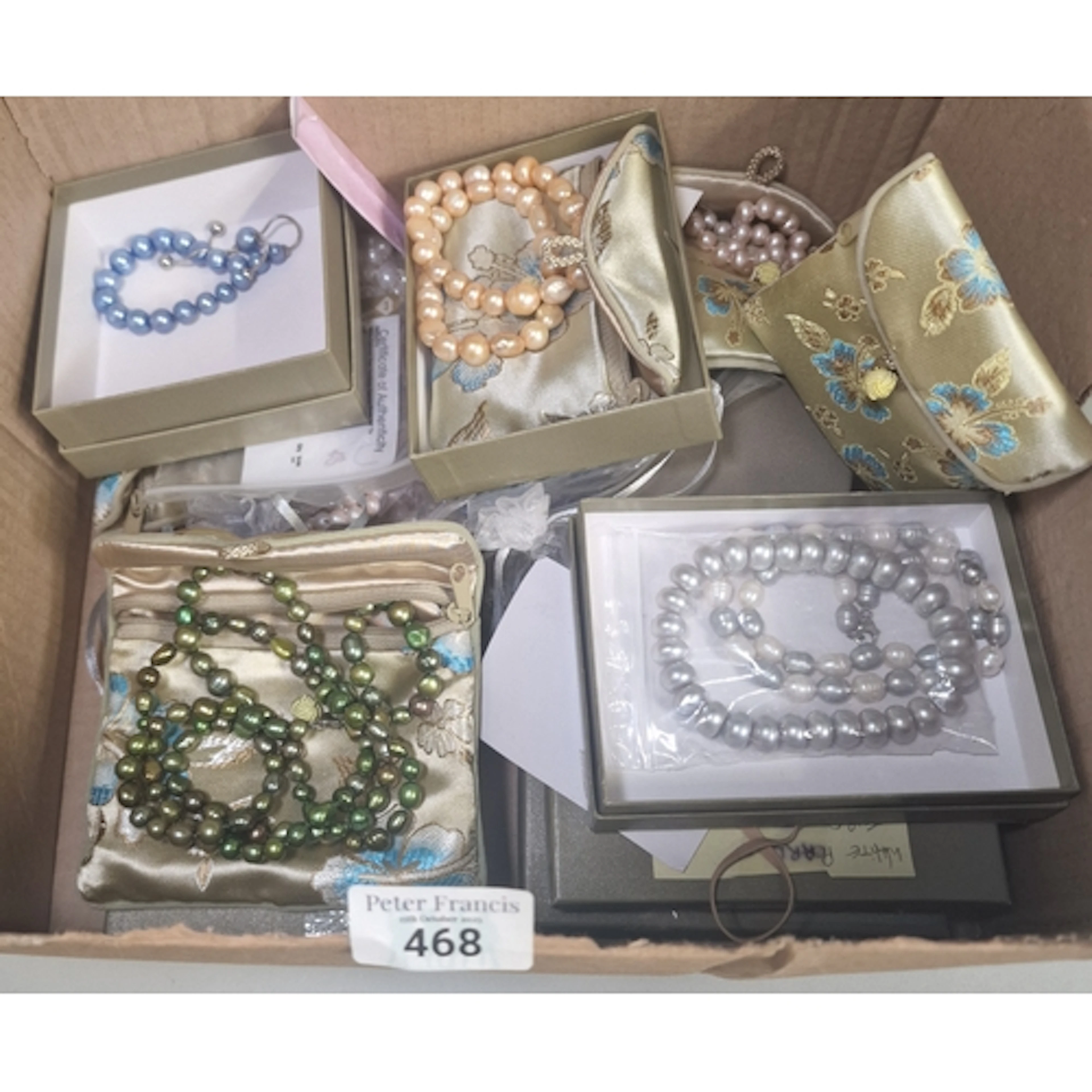 A large collection of pearls to include: white cultured pear...
