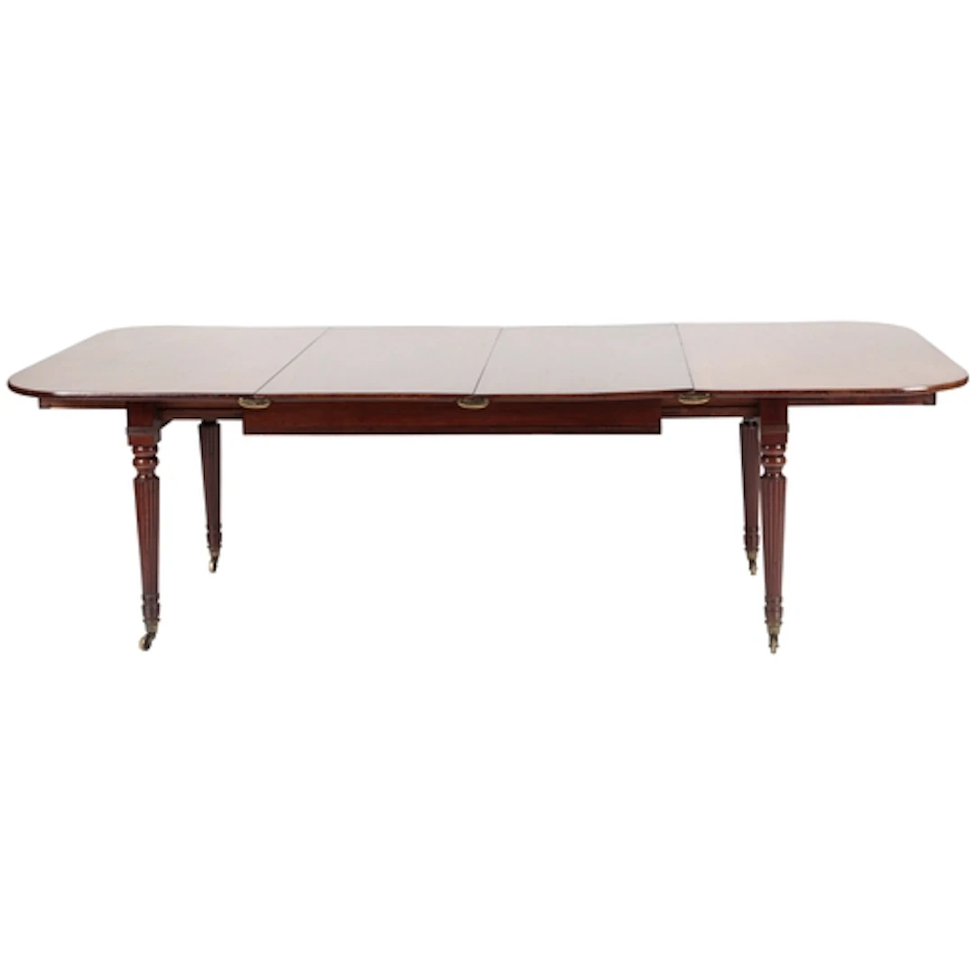 A Regency mahogany 'Butler's Patent' extending dining table,...