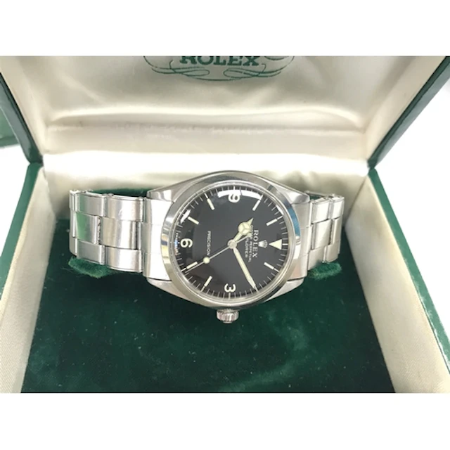 Vintage Rolex Ref. 5500 featuring a distinctive black dial w...