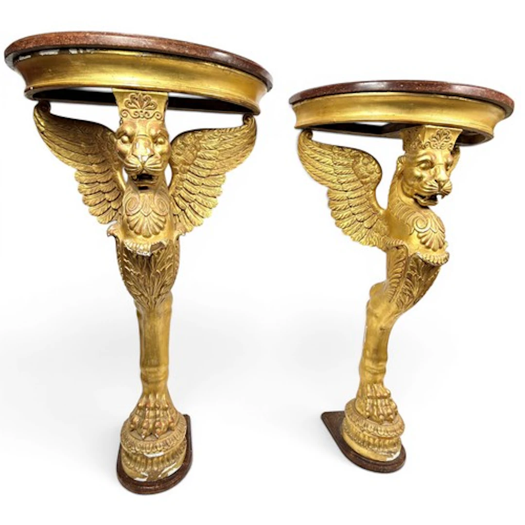 A good pair French console tables of demi-lune form in the E...