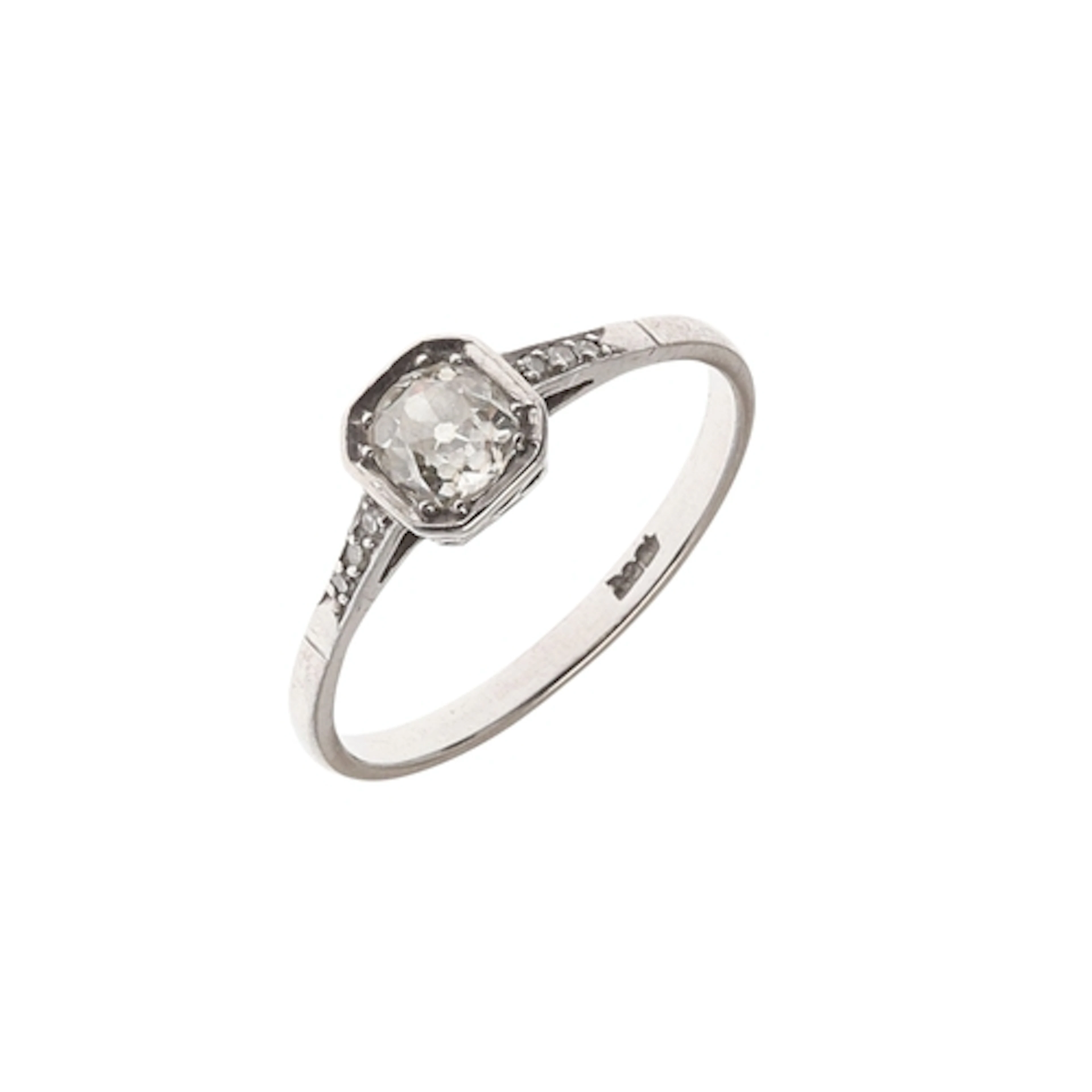 A DIAMOND SOLITAIRE RING. the cushion-shaped diamond is set ...