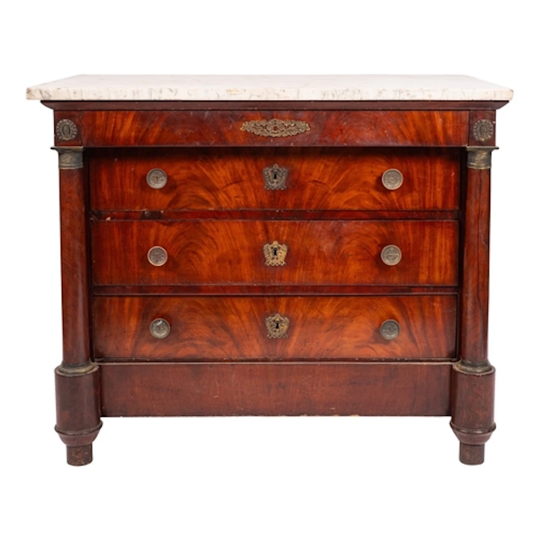 An Empire mahogany and marble toped commode, early 19th cent...