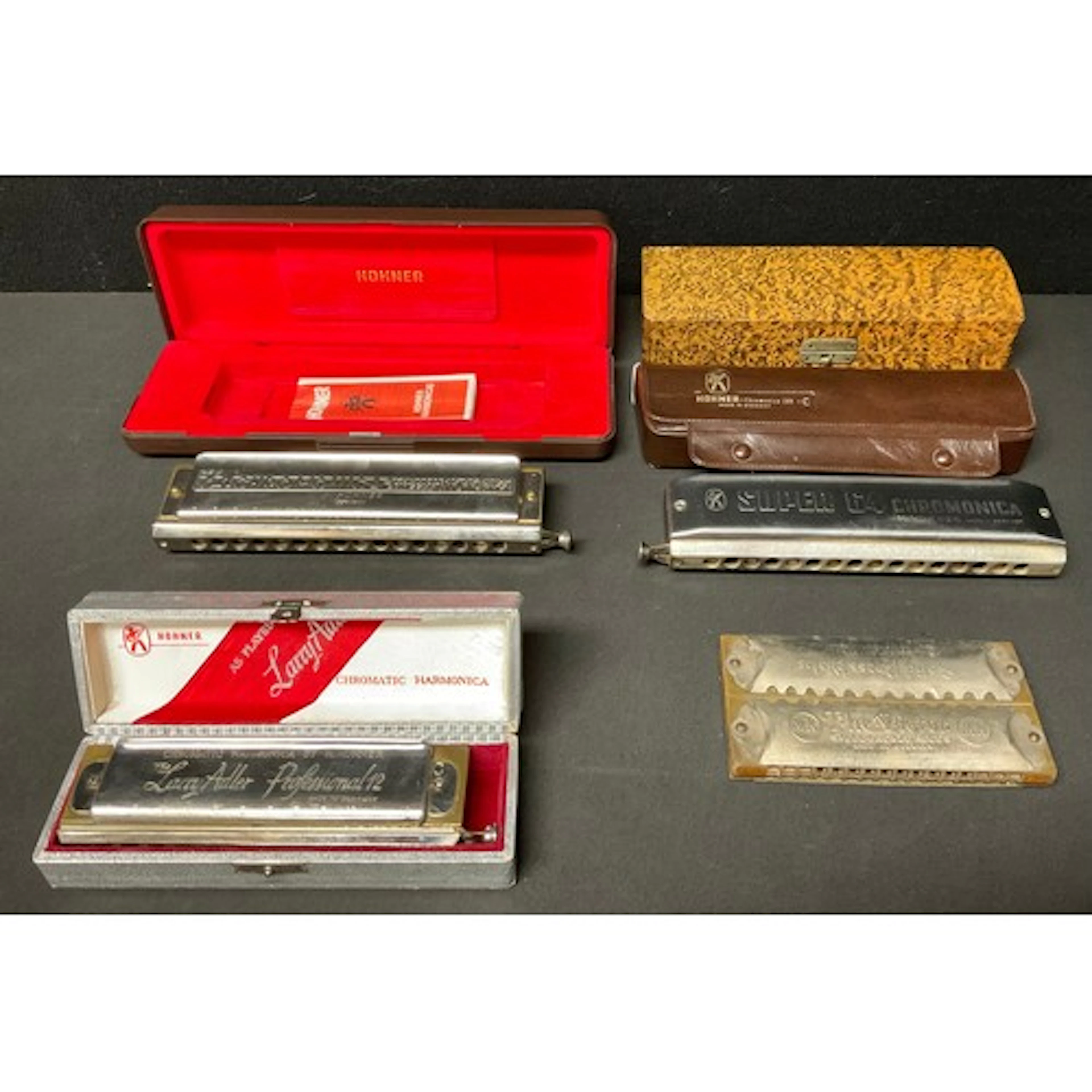 Musical Instruments - a Hohner 64 Chromonica 280 C, cased; a...