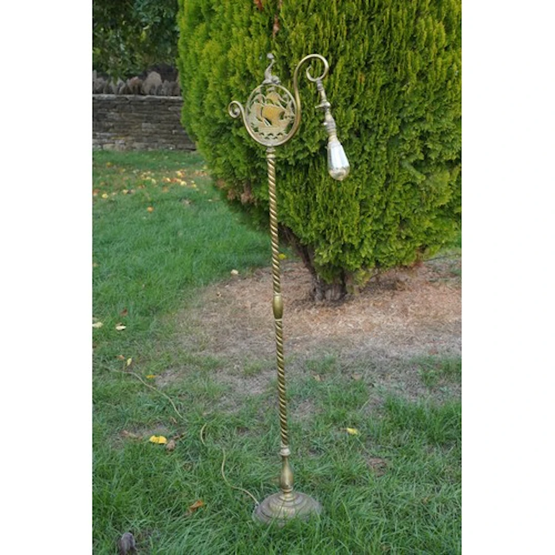 Early 20th century brass standard lamp, with pierced circula...