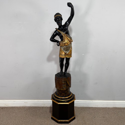 An antique Italian carved wood and polychrome painted blacka...
