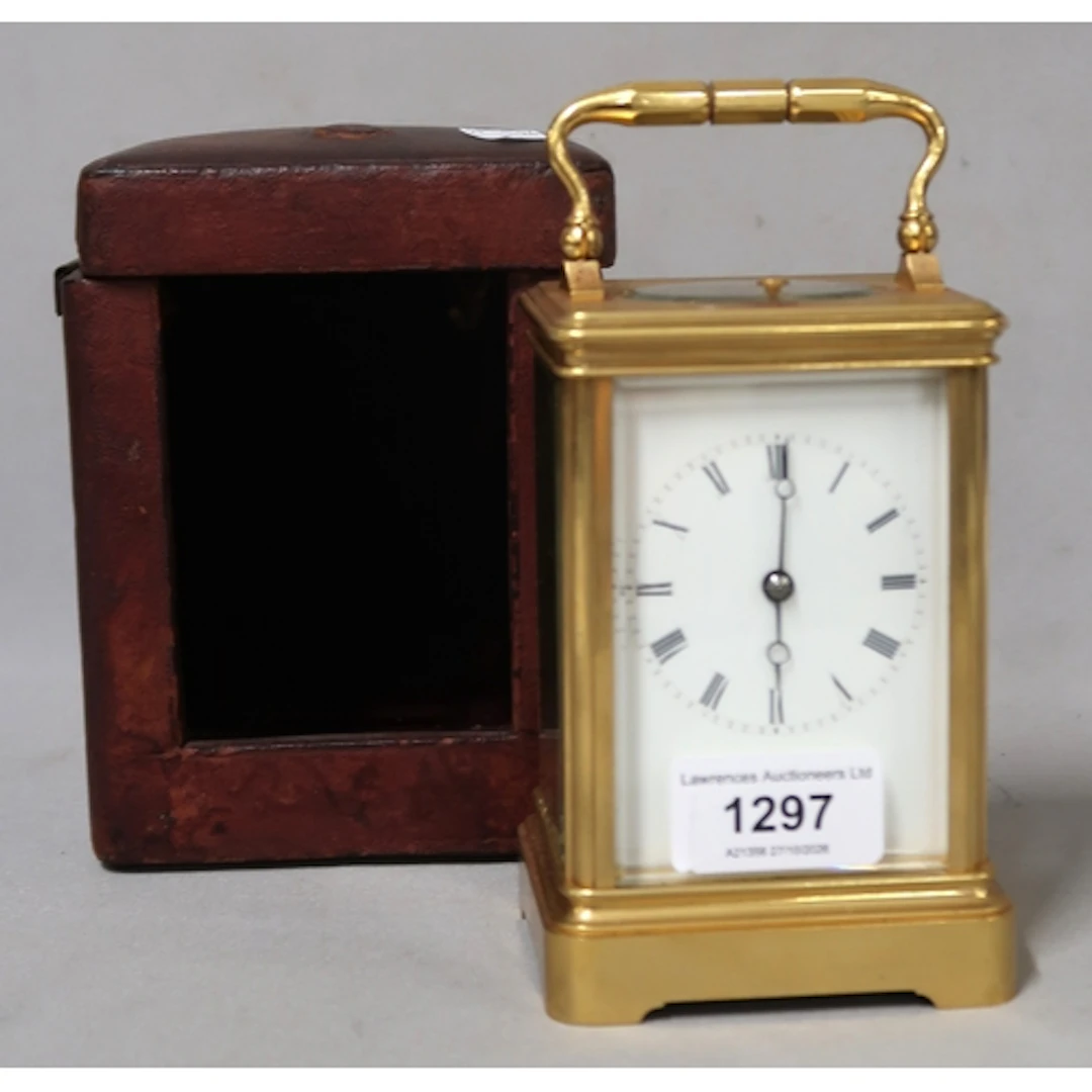 Early 20th Century gilt brass carriage clock, the enamel dia...