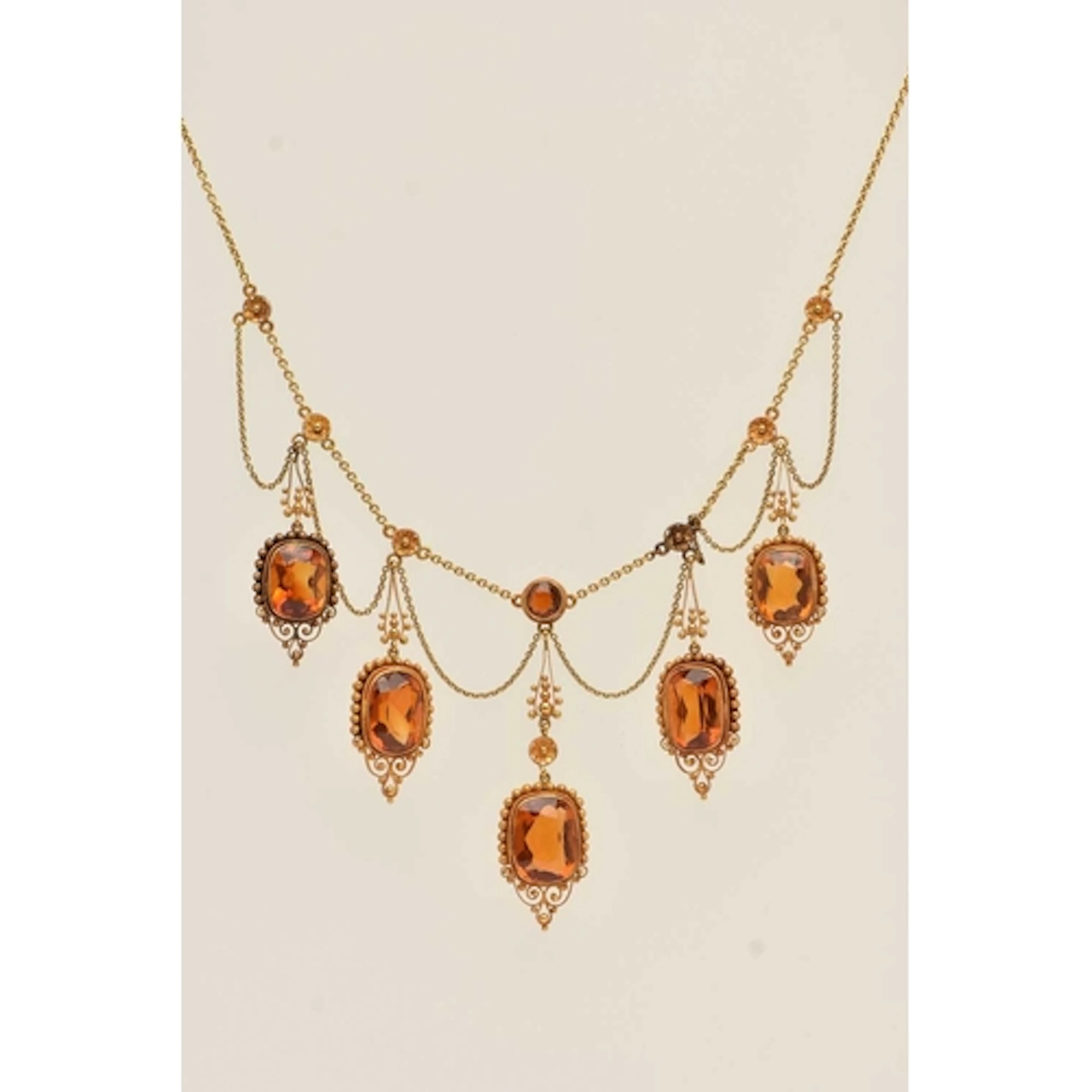 A mid 19th century 18ct gold citirne necklace. Desinged as a...