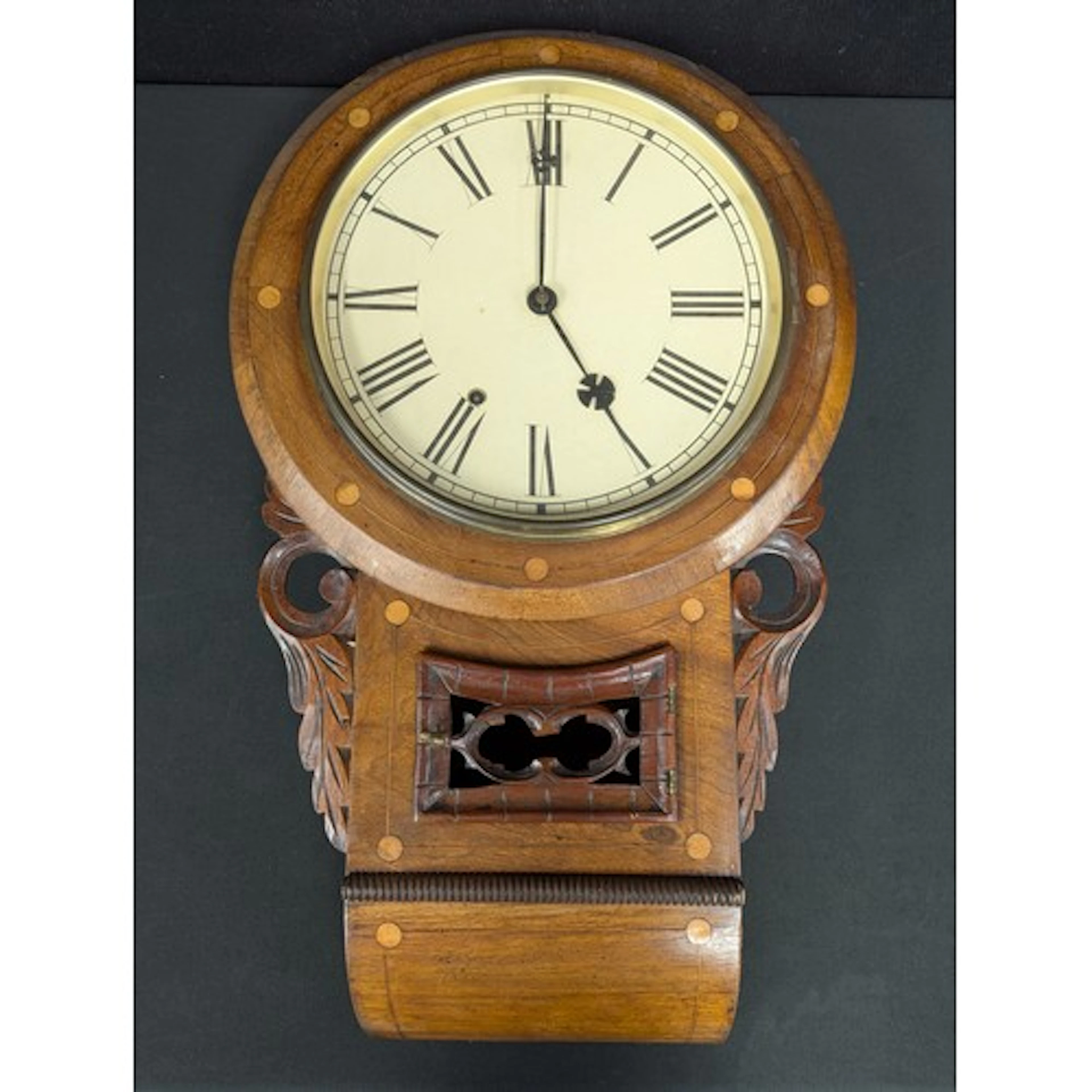 A rosewood and mahogany boxwood inlaid drop-dial wall clock