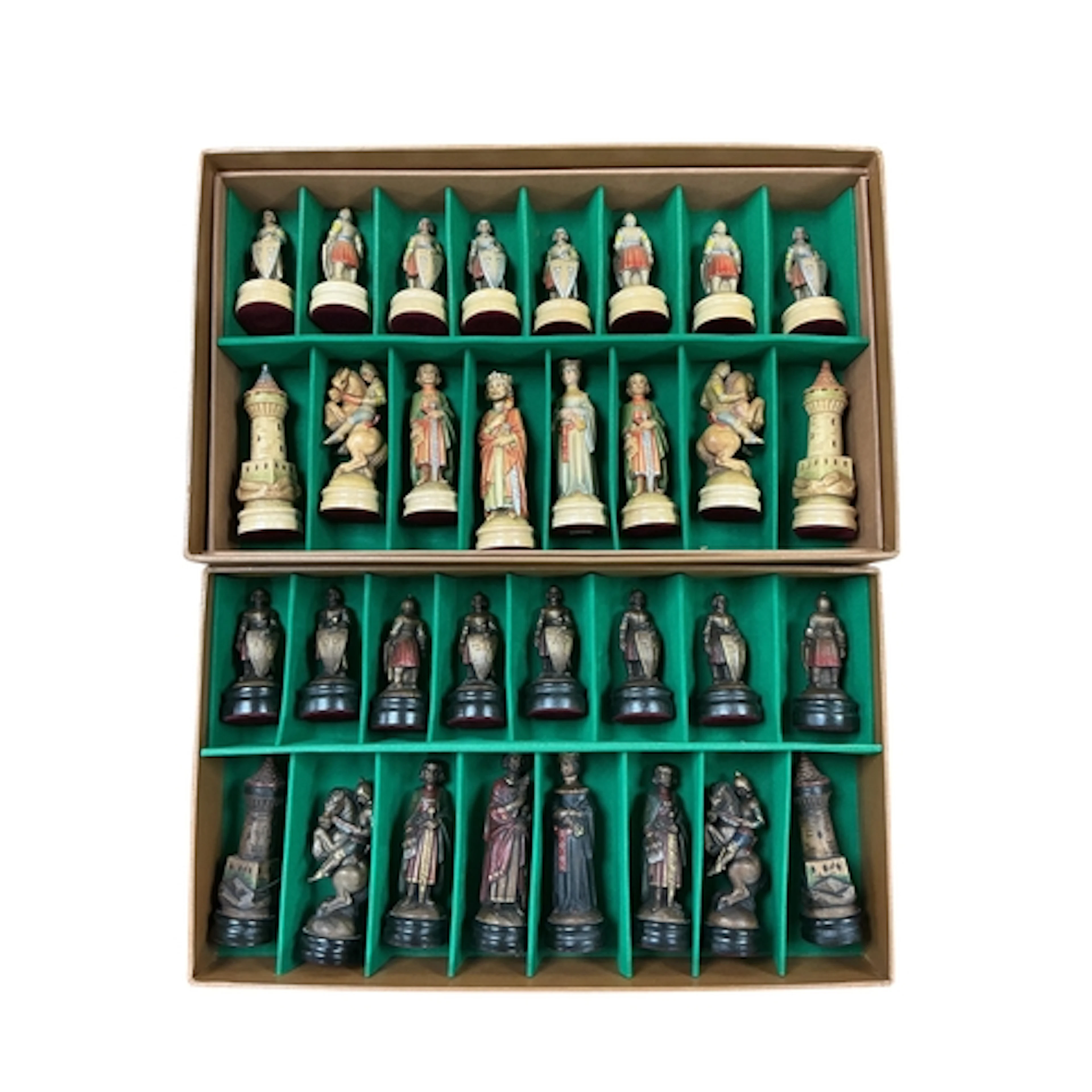 An Italian Anri carved wood King Arthur chess set, cased, Ki...