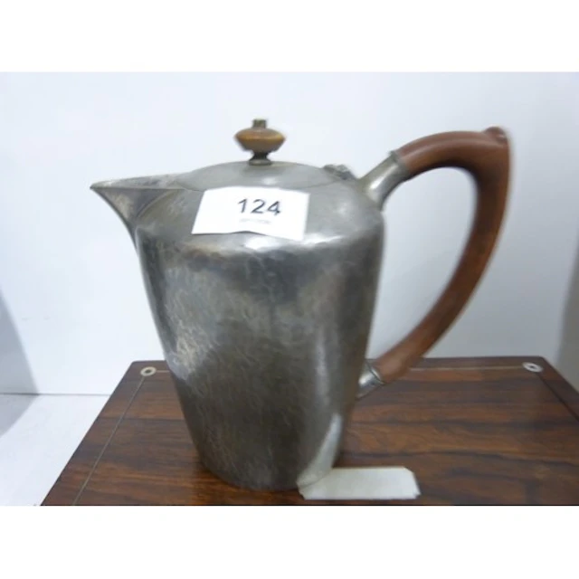 Tuderic by Liberty & Co, beaten hot water jug. 18cm high...