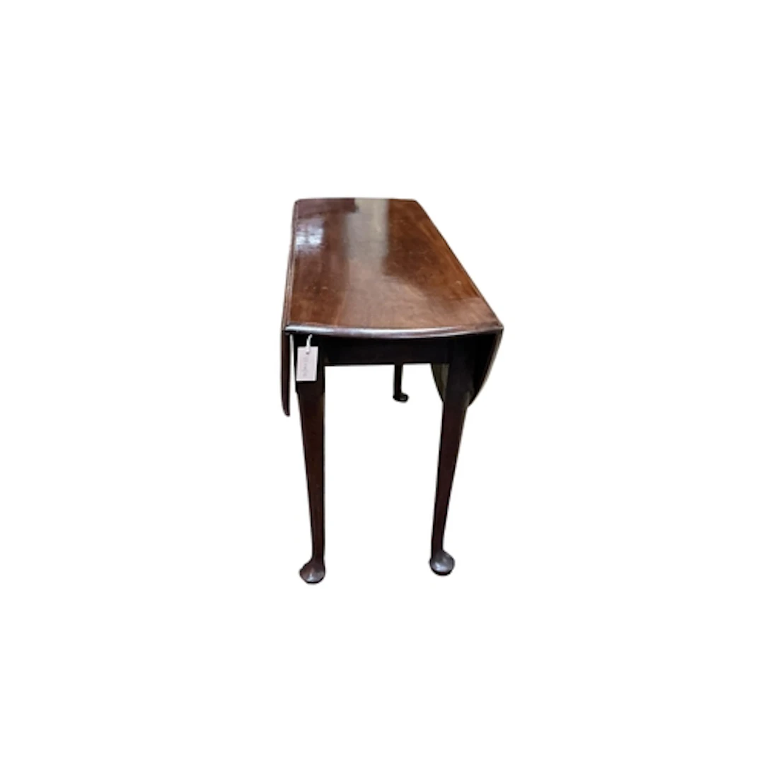 A George III mahogany drop leaf pad foot dining table, width...