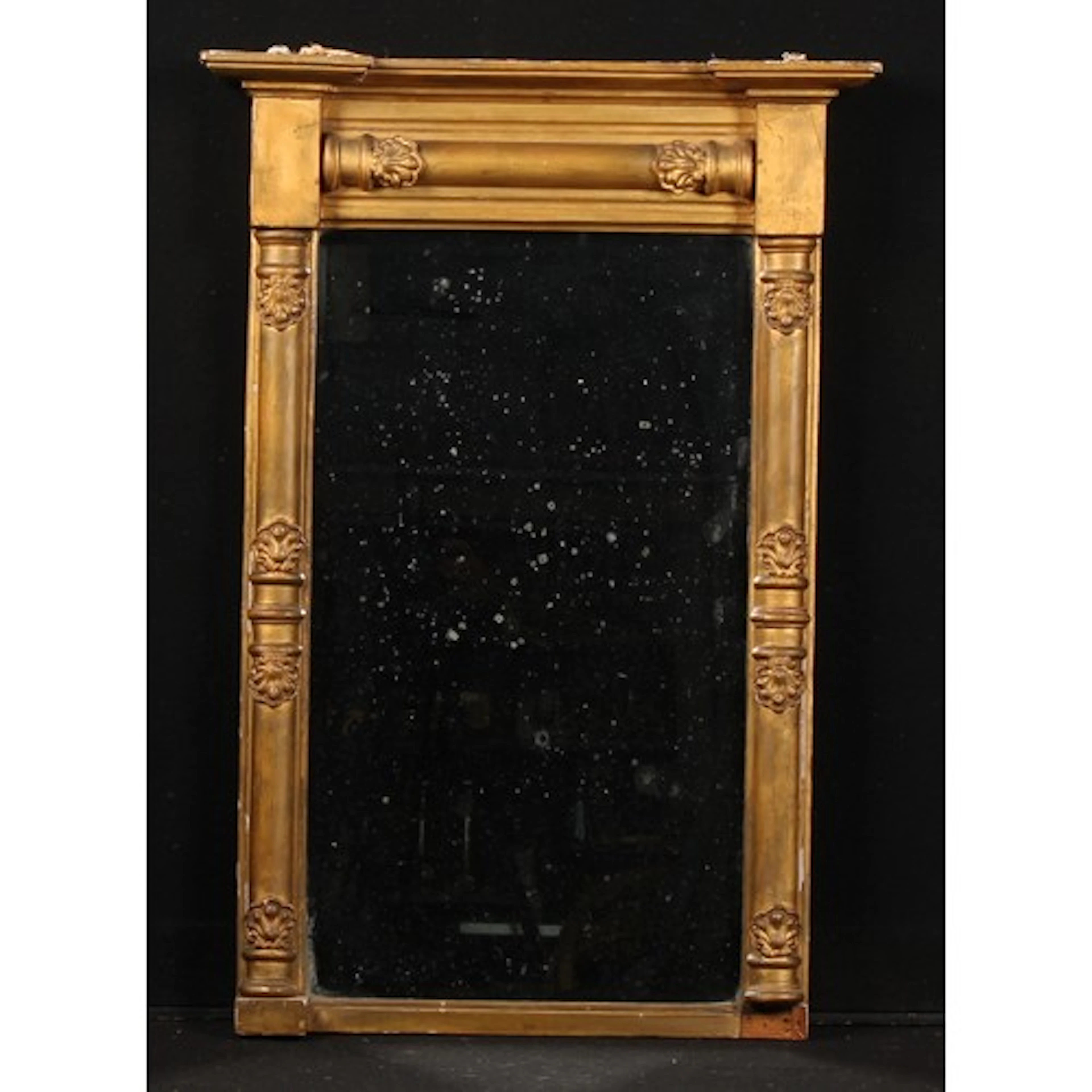 A 19th century giltwood and gesso pier glass, bevelled mirro...