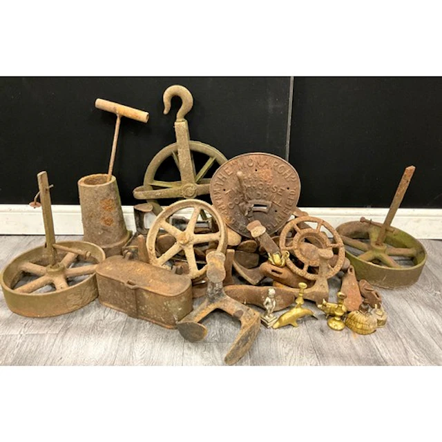 A large collection of cast iron shoe lasts, and a cast iron ...