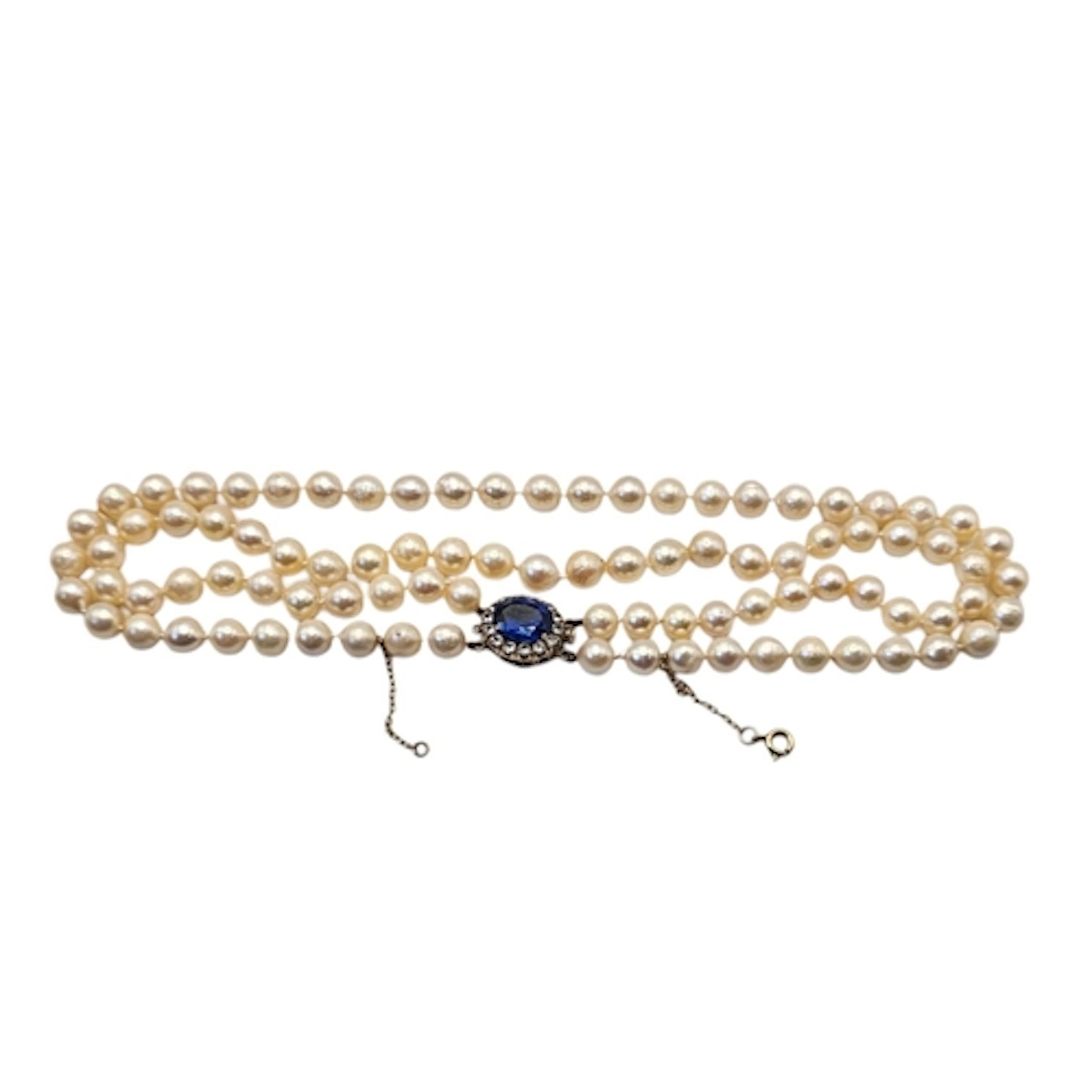 A VINTAGE 9CT GOLD, BLUE TOPAZ AND WHITE SAPPHIRE PEARL NECK...