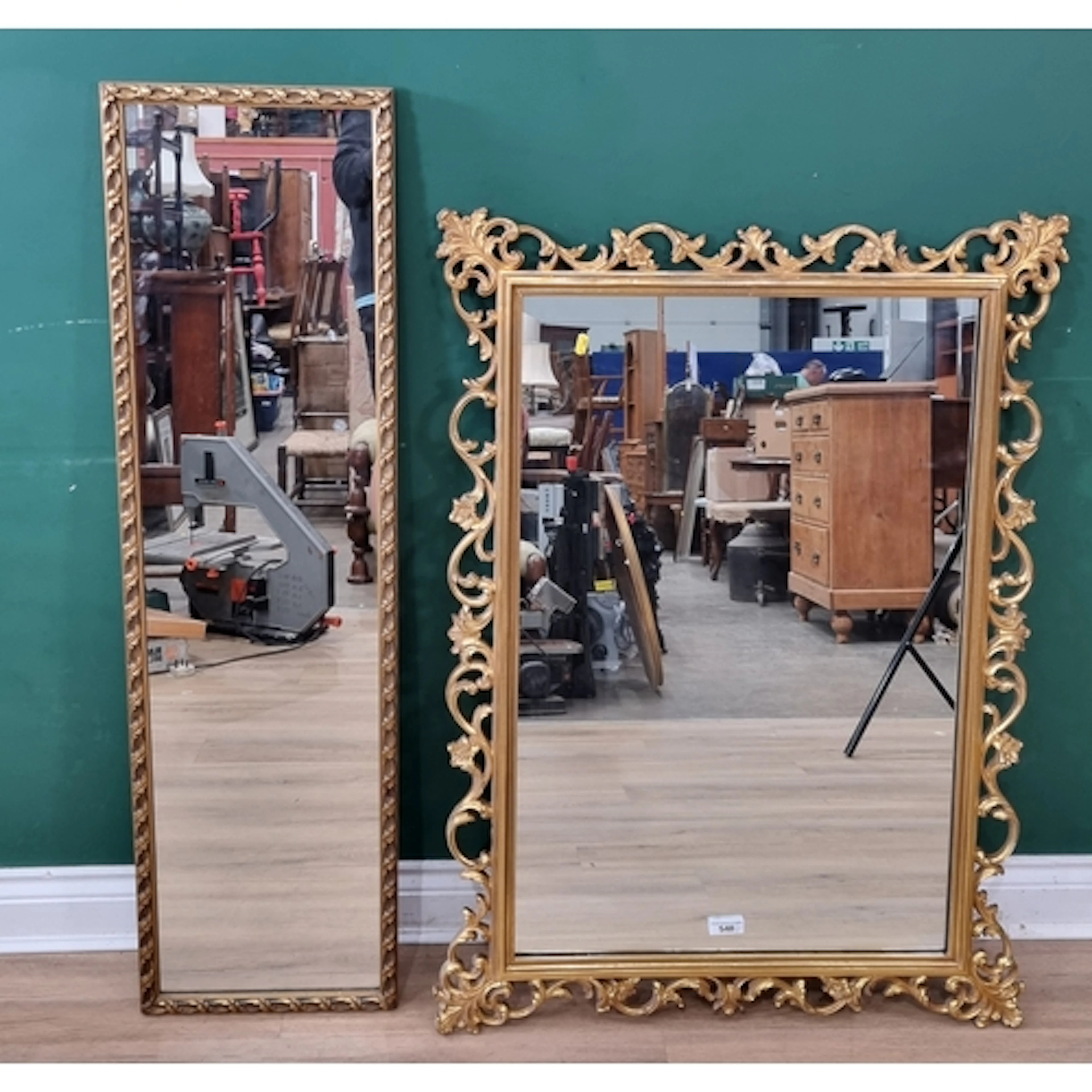 A reproduction gilt framed Wall Mirror with acanthus scroll ...