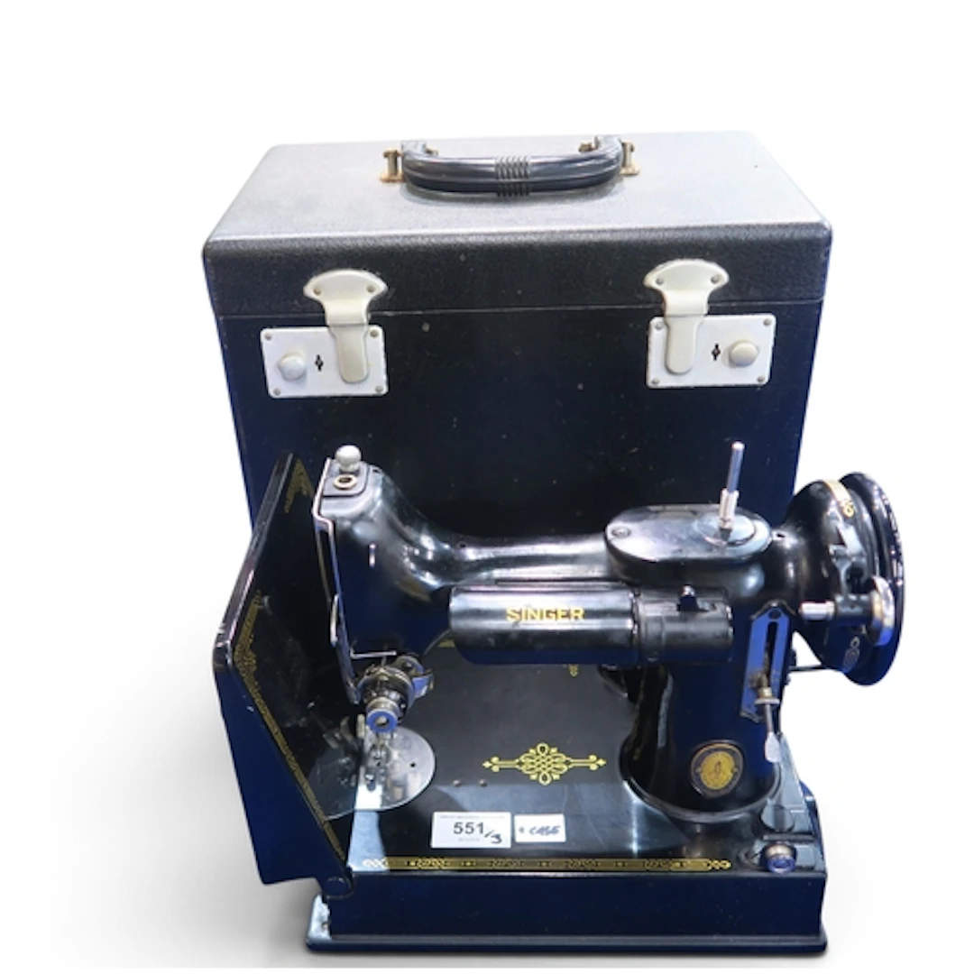 A Singer Featherweight sewing machine, with 1951 Centennial ...