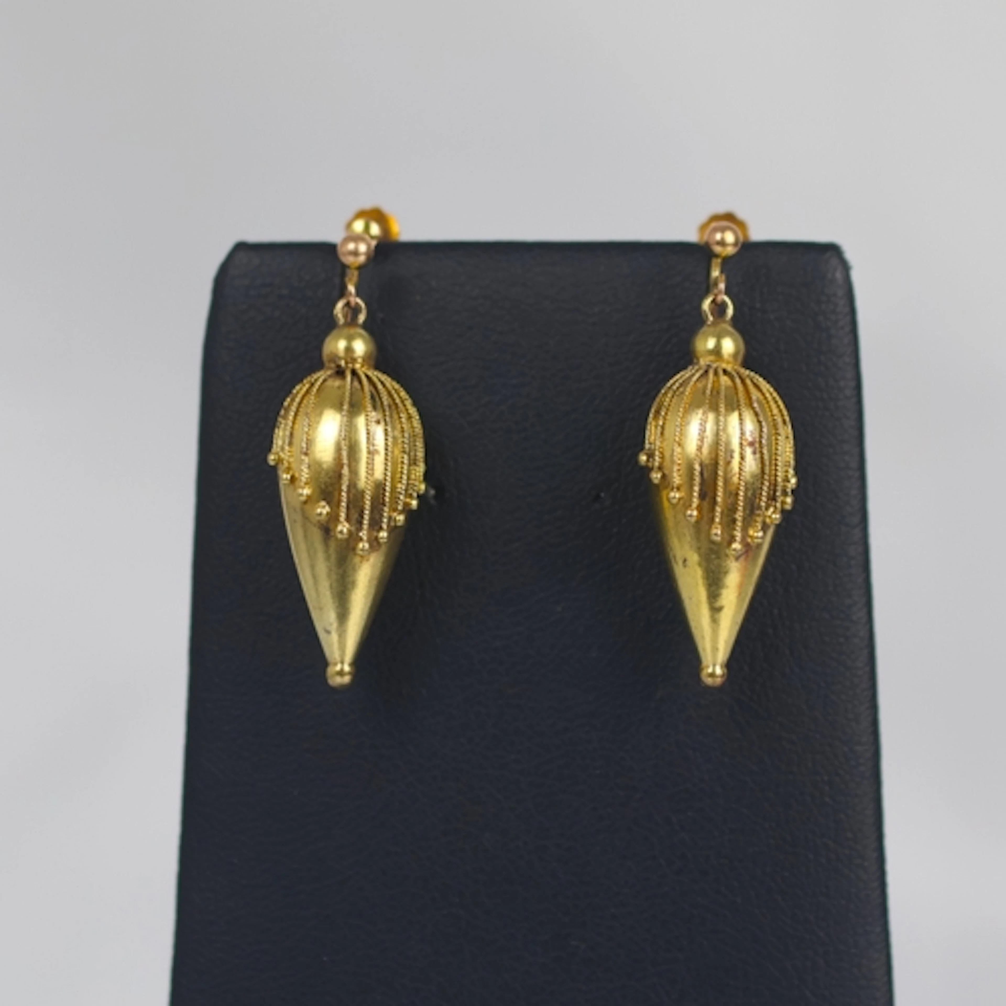 A pair of 19th century Etruscan style earrings, the torpedo ...