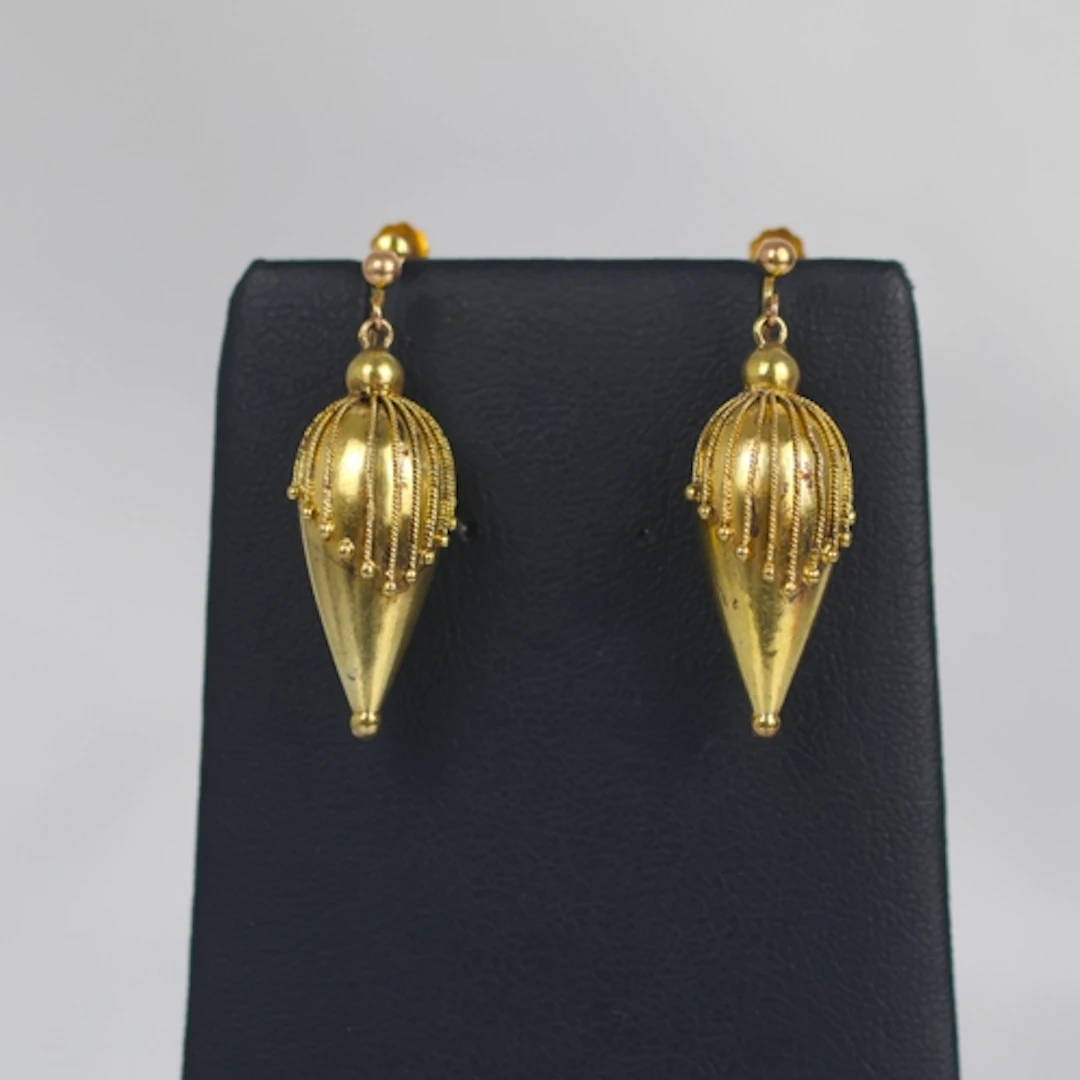 A pair of 19th century Etruscan style earrings, the torpedo ...