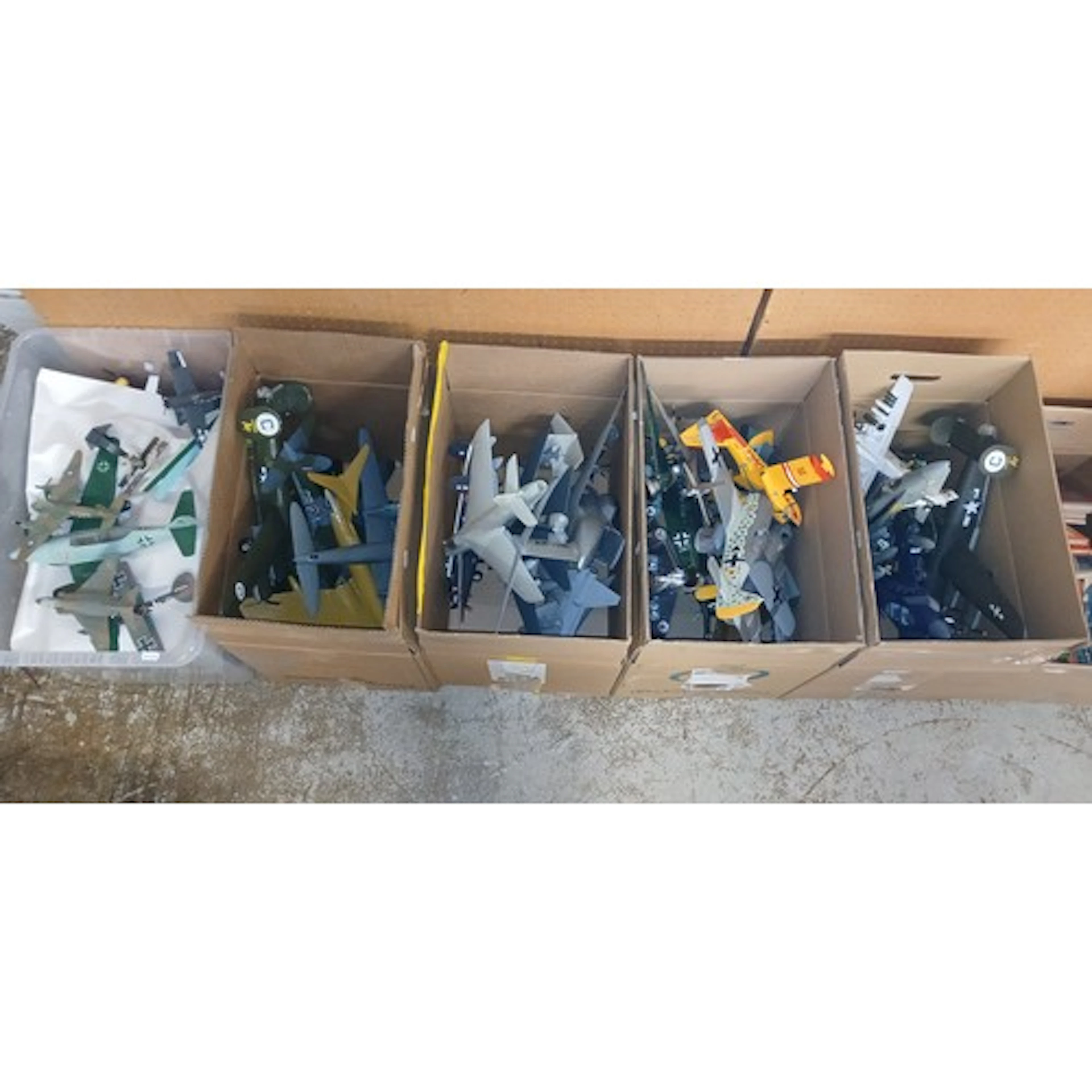 Five boxes of assorted airfix built planes.