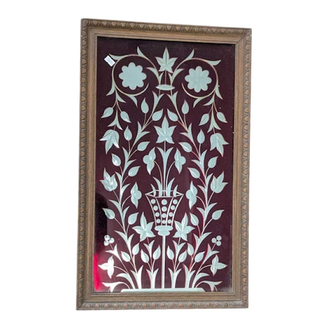 A 20th century ruby flash glass panel. The panel having cent...