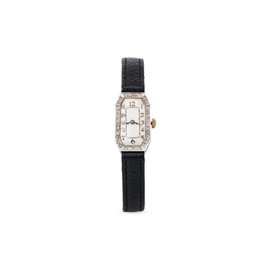 A LADY'S 18CT WHITE GOLD AND DIAMOND SET COCKTAIL WATCH, the...