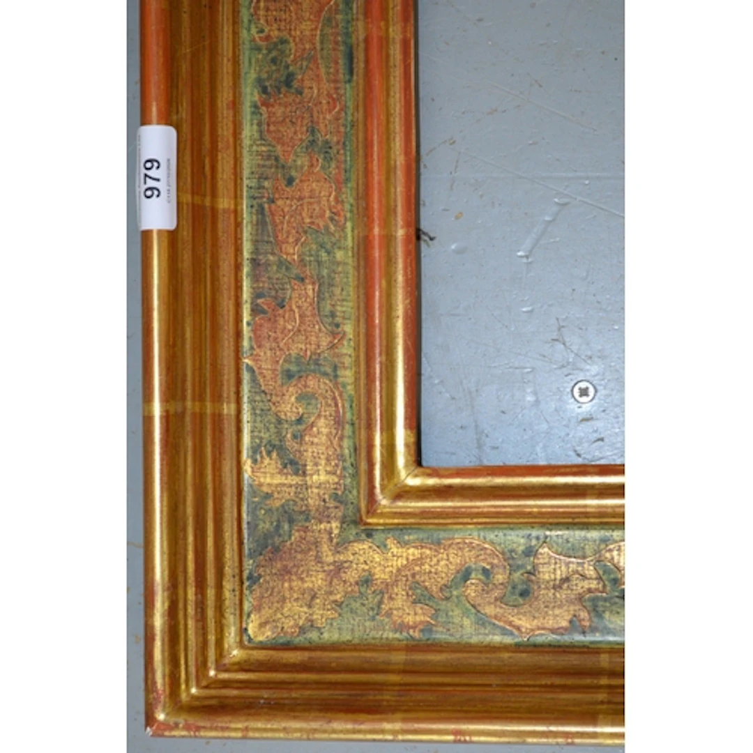 Giltwood cassetta frame with painted and gilt incised decora...