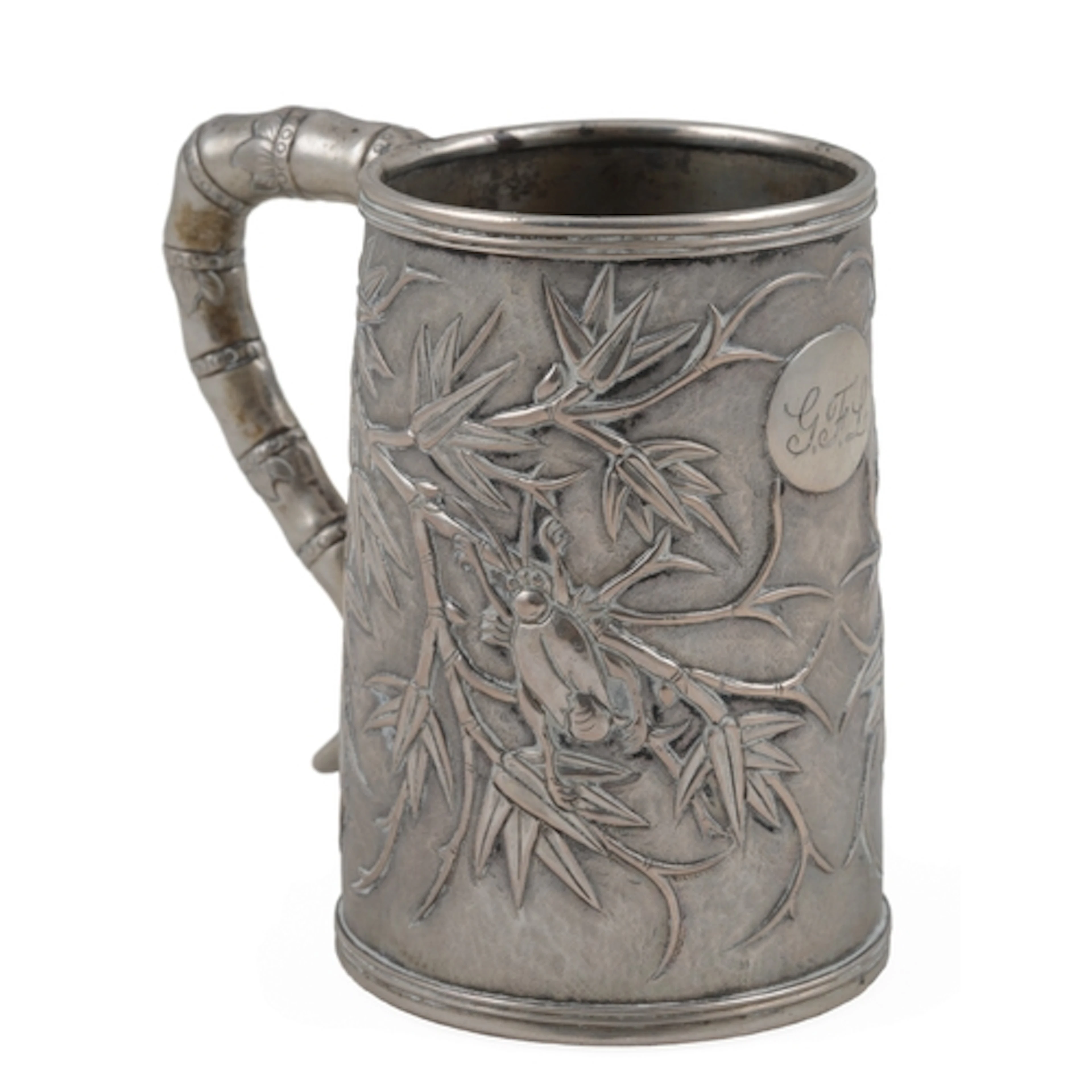 A late 19th century Chinese Export white metal mug, by Cutsh...