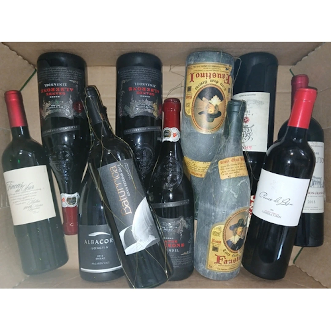 Four boxes of assorted red wines mincluding Dead Arm shiraz ...