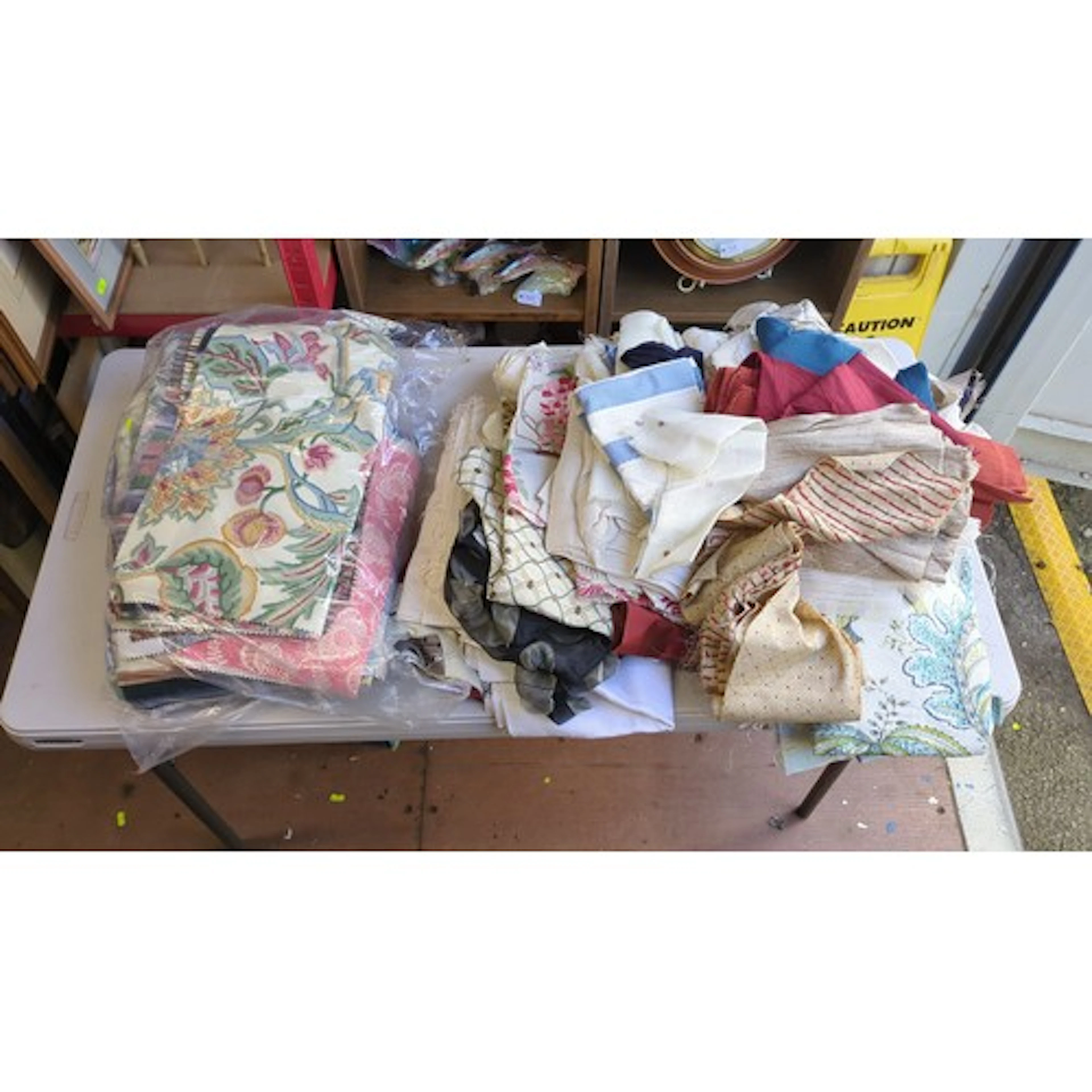 A quantity of upholstery and curtain fabric remnants, includ...