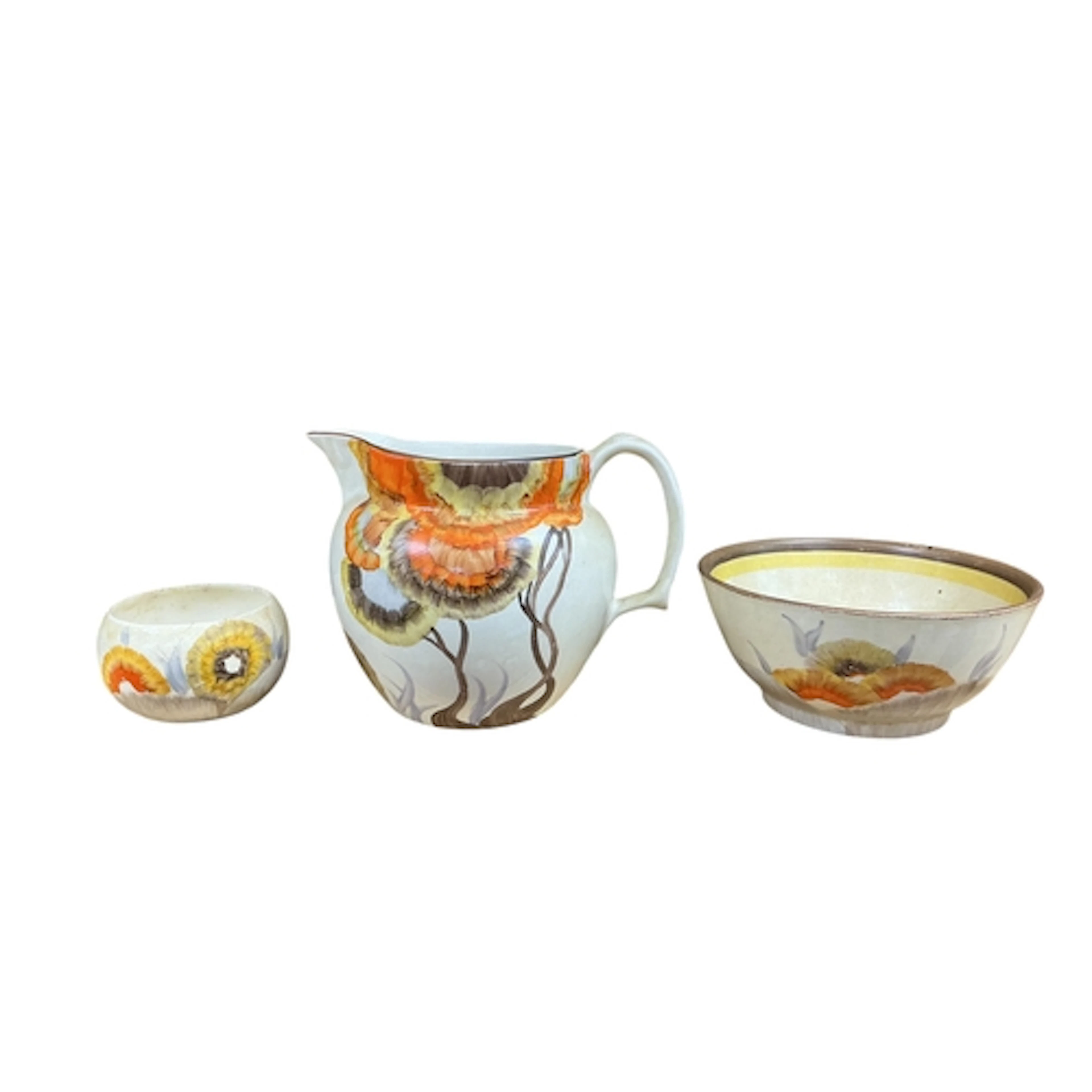 A Clarice Cliff Rhodanthe bizarre jug, height 15cm a sugar b...