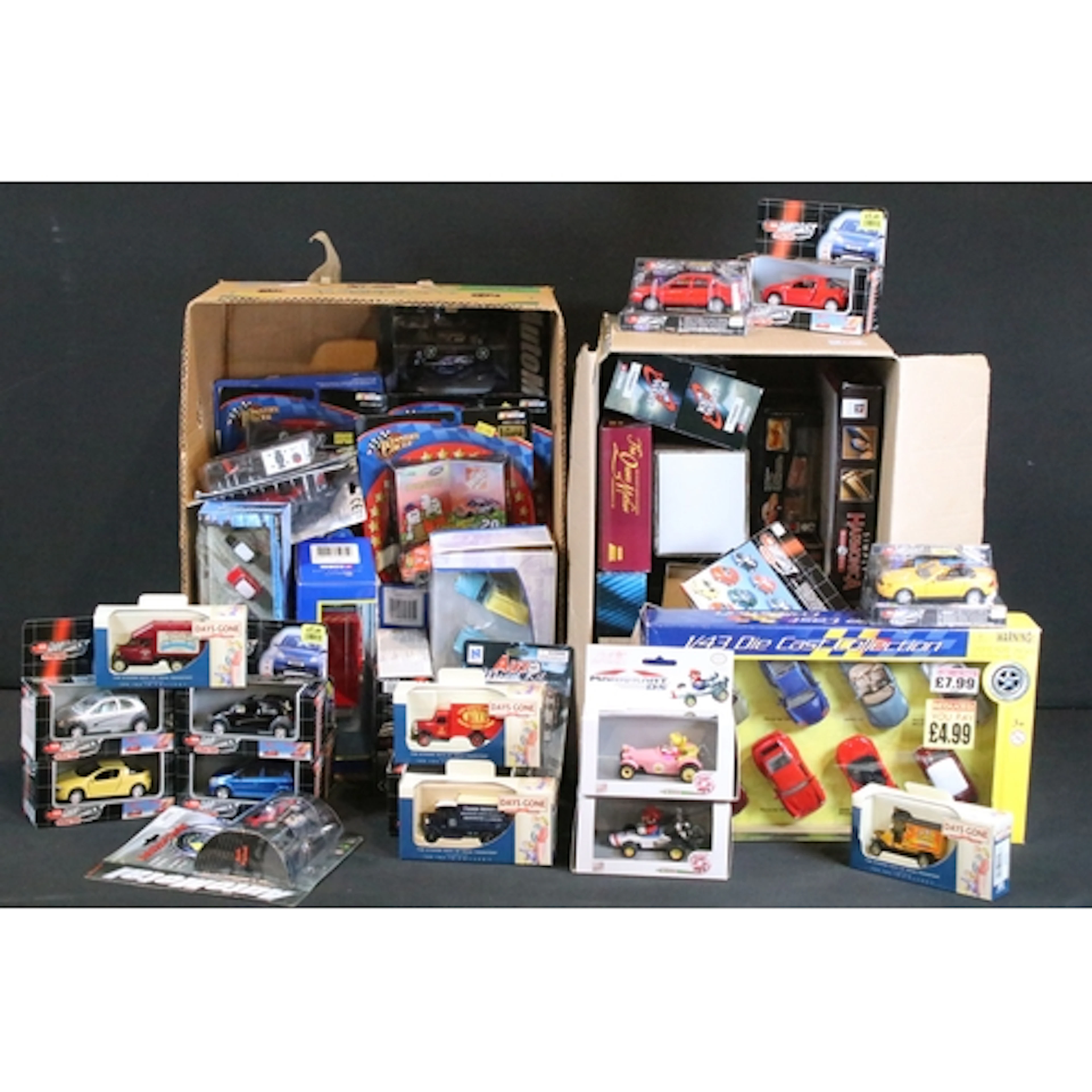 Around 65 boxed / carded diecast models to include Corgi Red...