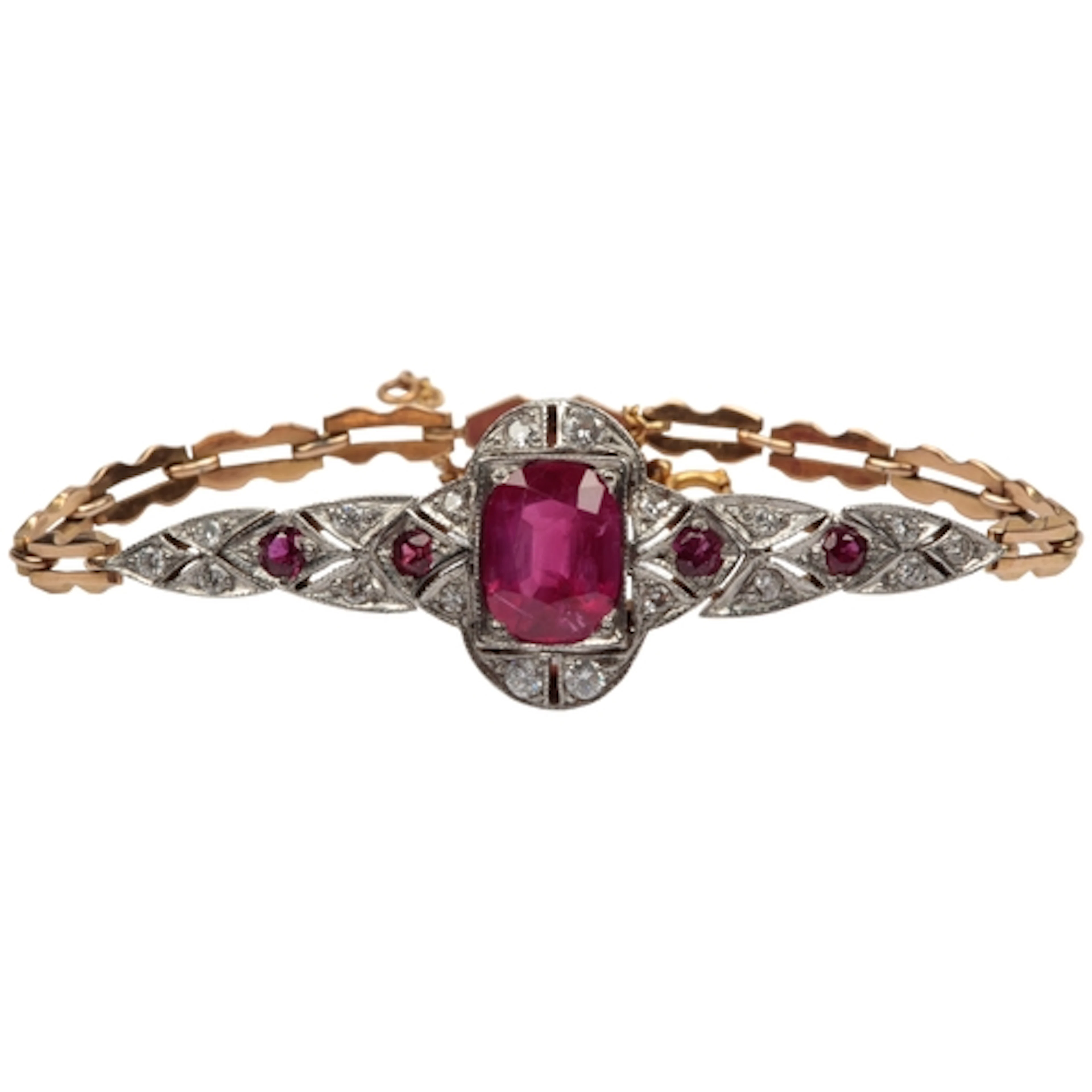 A fine ruby and diamond bracelet, centring on oval cushion-s...