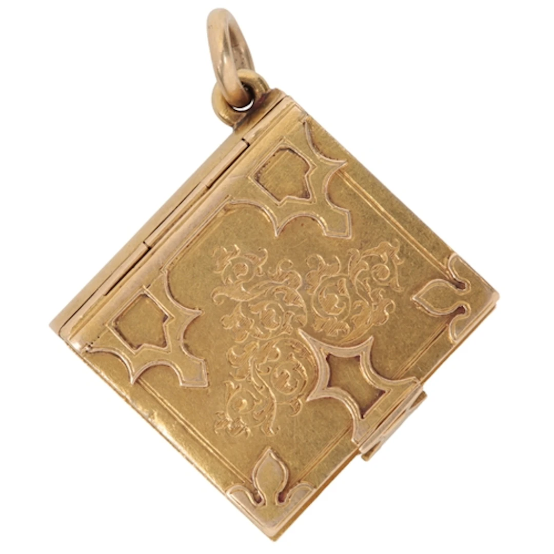 An unusual gold locket charm pendant, late 19th century, des...