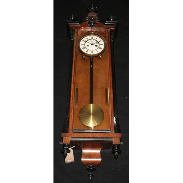A 19th century walnut and parcel-ebonised Vienna regulator w...
