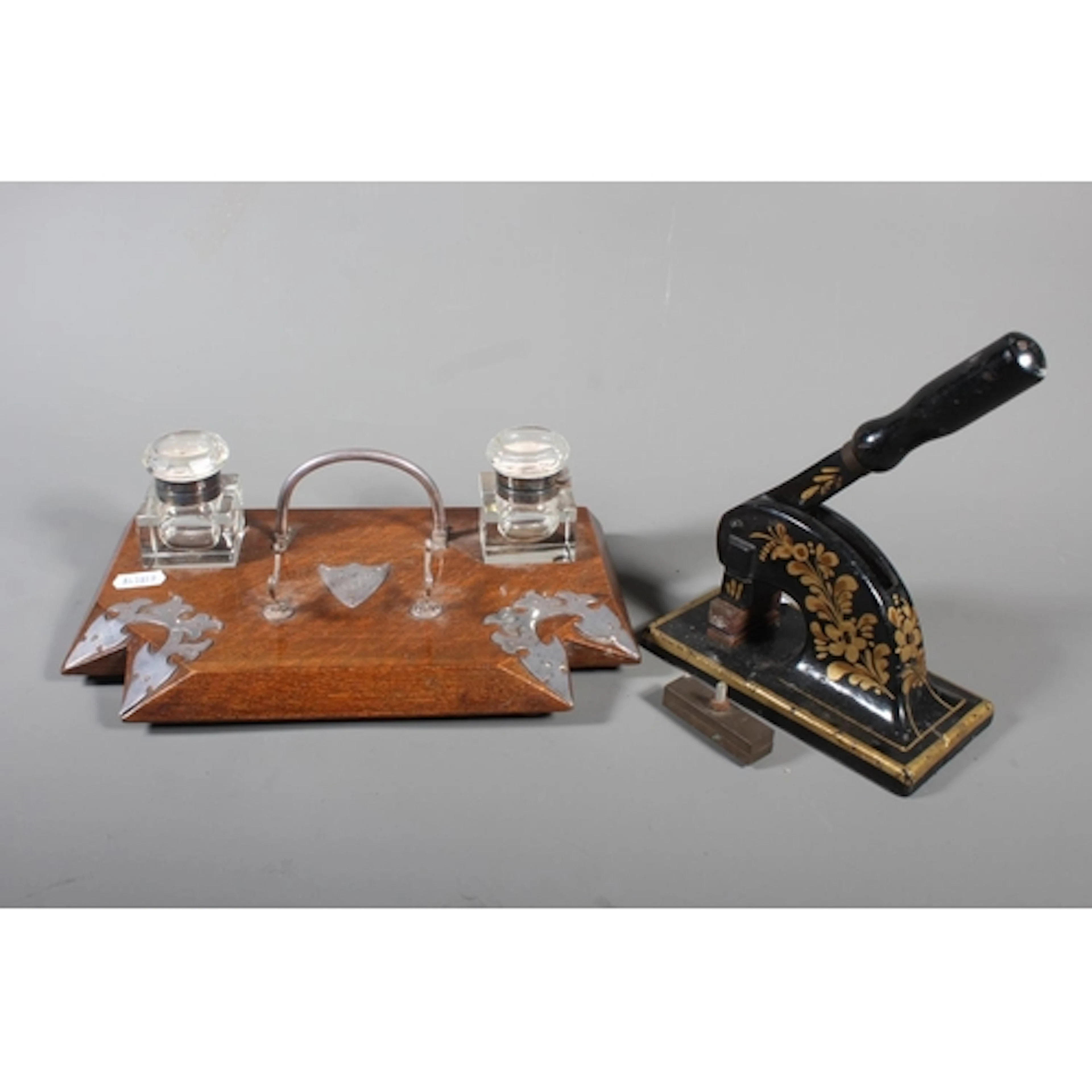Late 19th century oak deskstand with opposing glass inkwells...