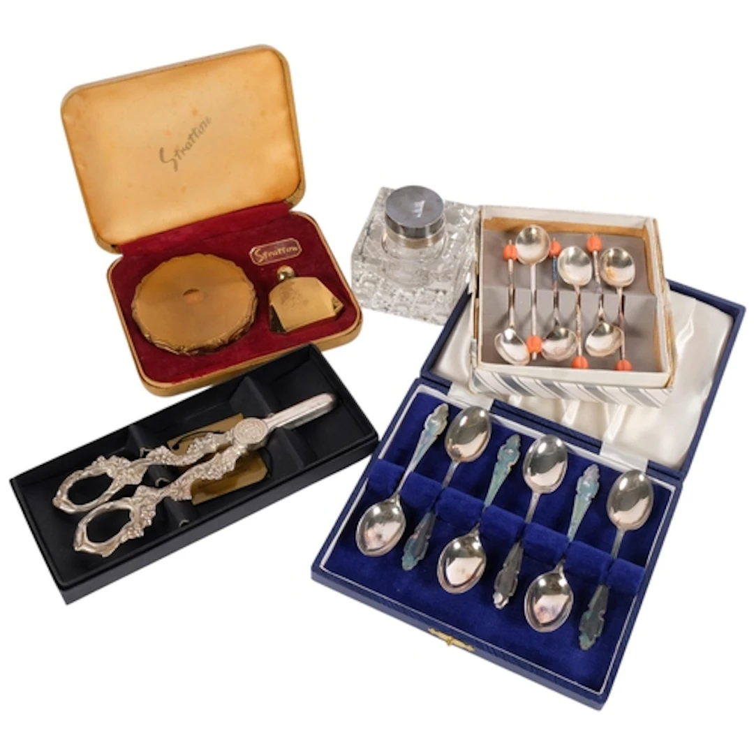 An interesting collection of silver and plated items, includ...