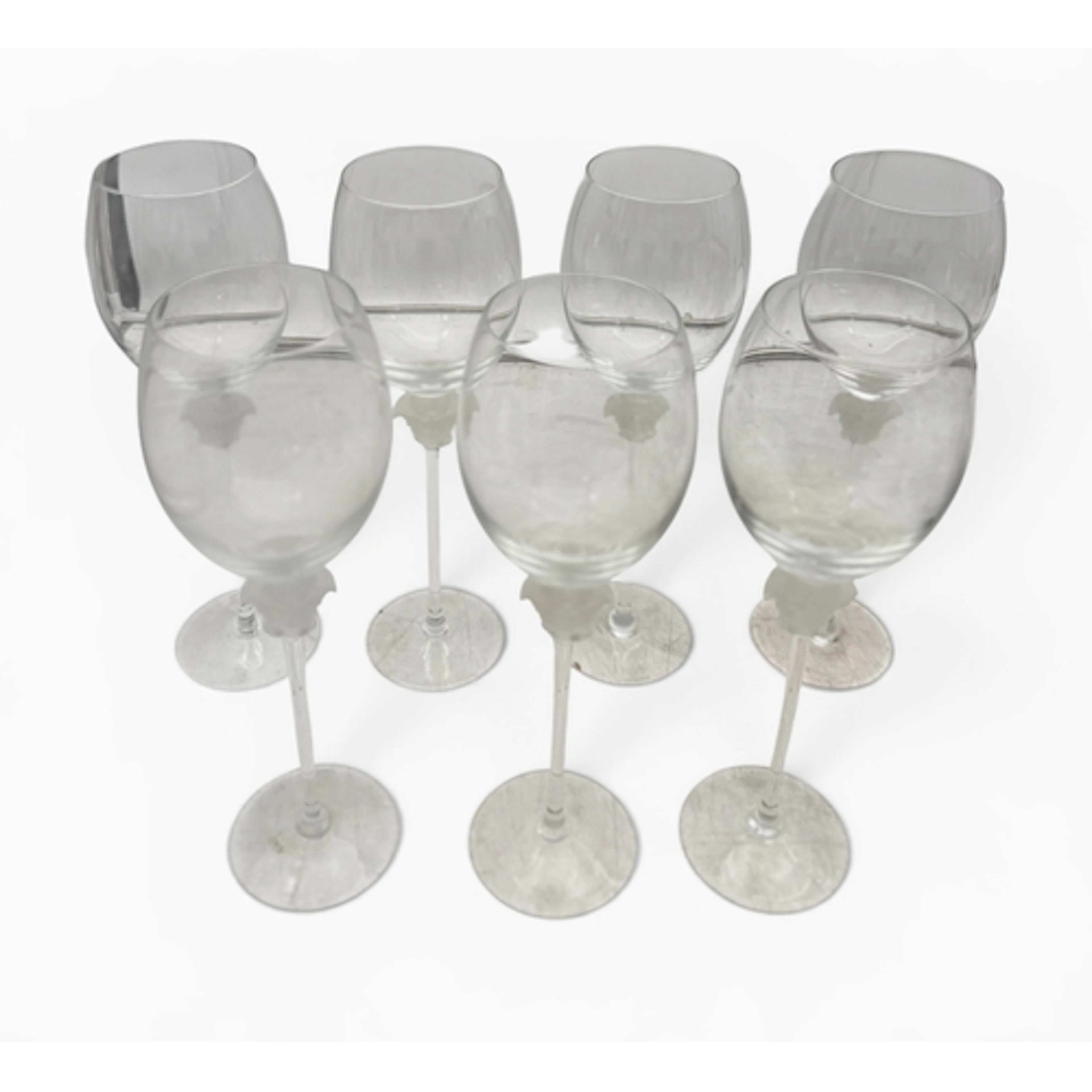 A SET OF SEVEN VERSACE ROSENTHAL LONG STEM DRINKING GLASSES ...