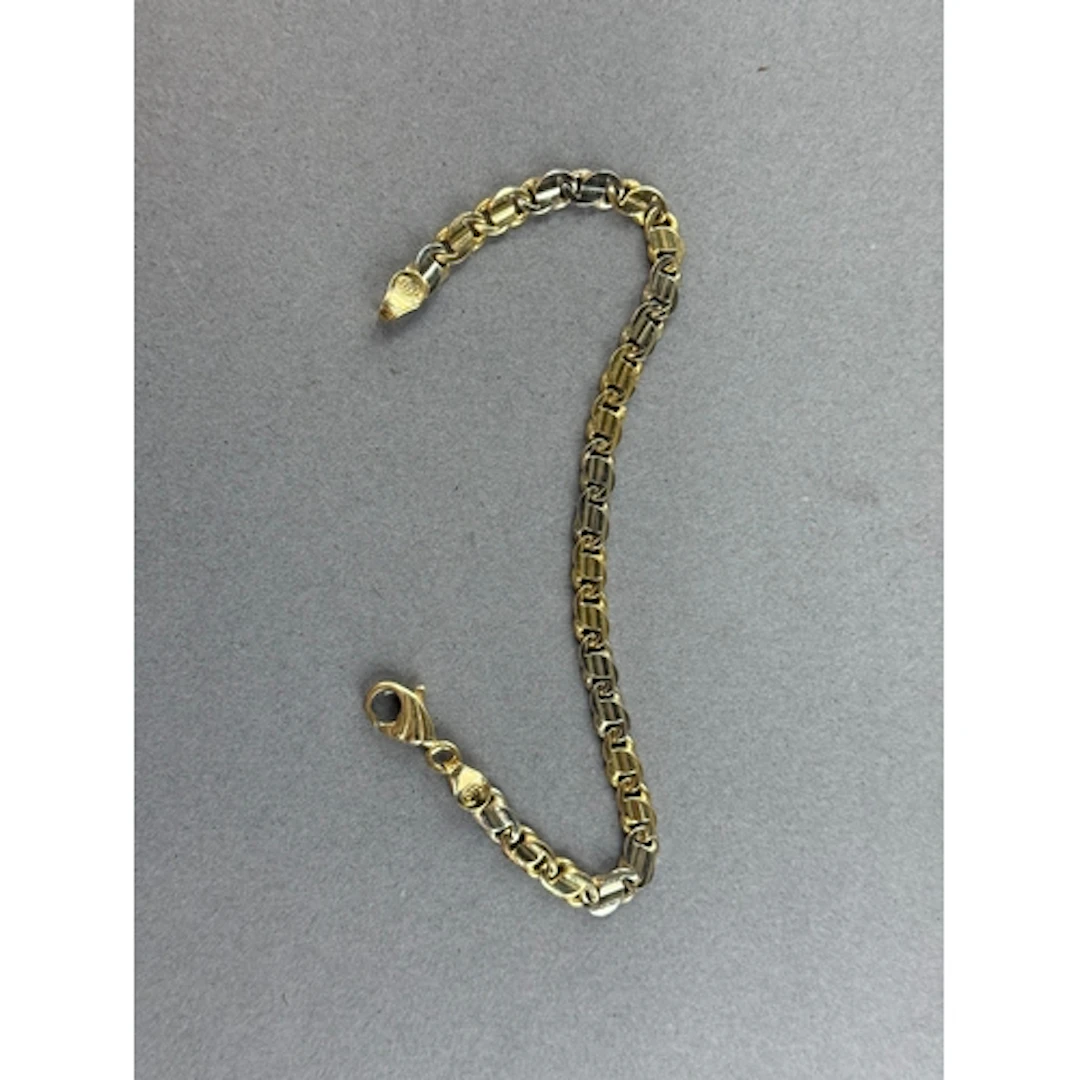 Jewellery: a yellow metal flattened curb link bracelet, Ital...