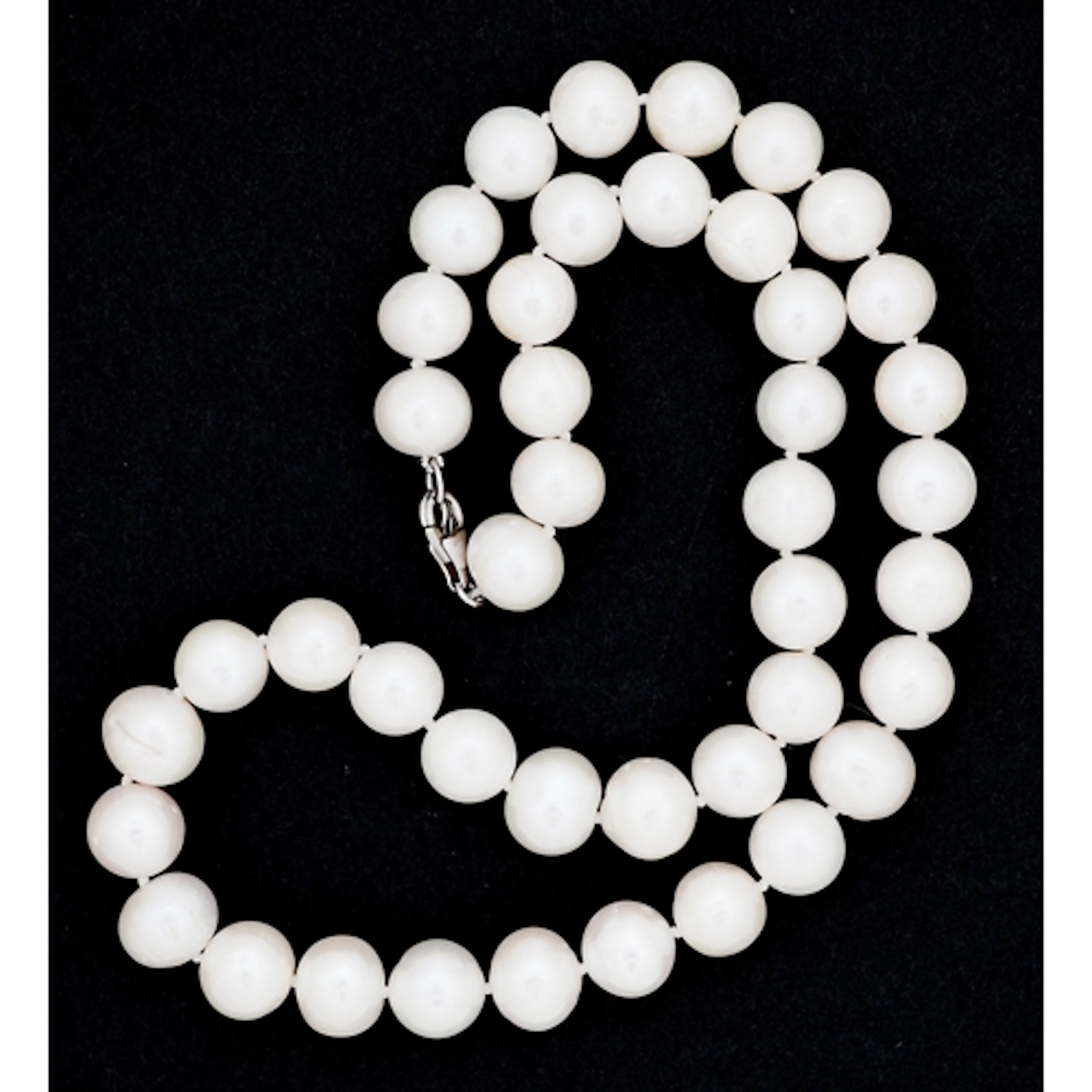 Cultured pearl necklace with silver clasp, each pearl 9.2mm ...