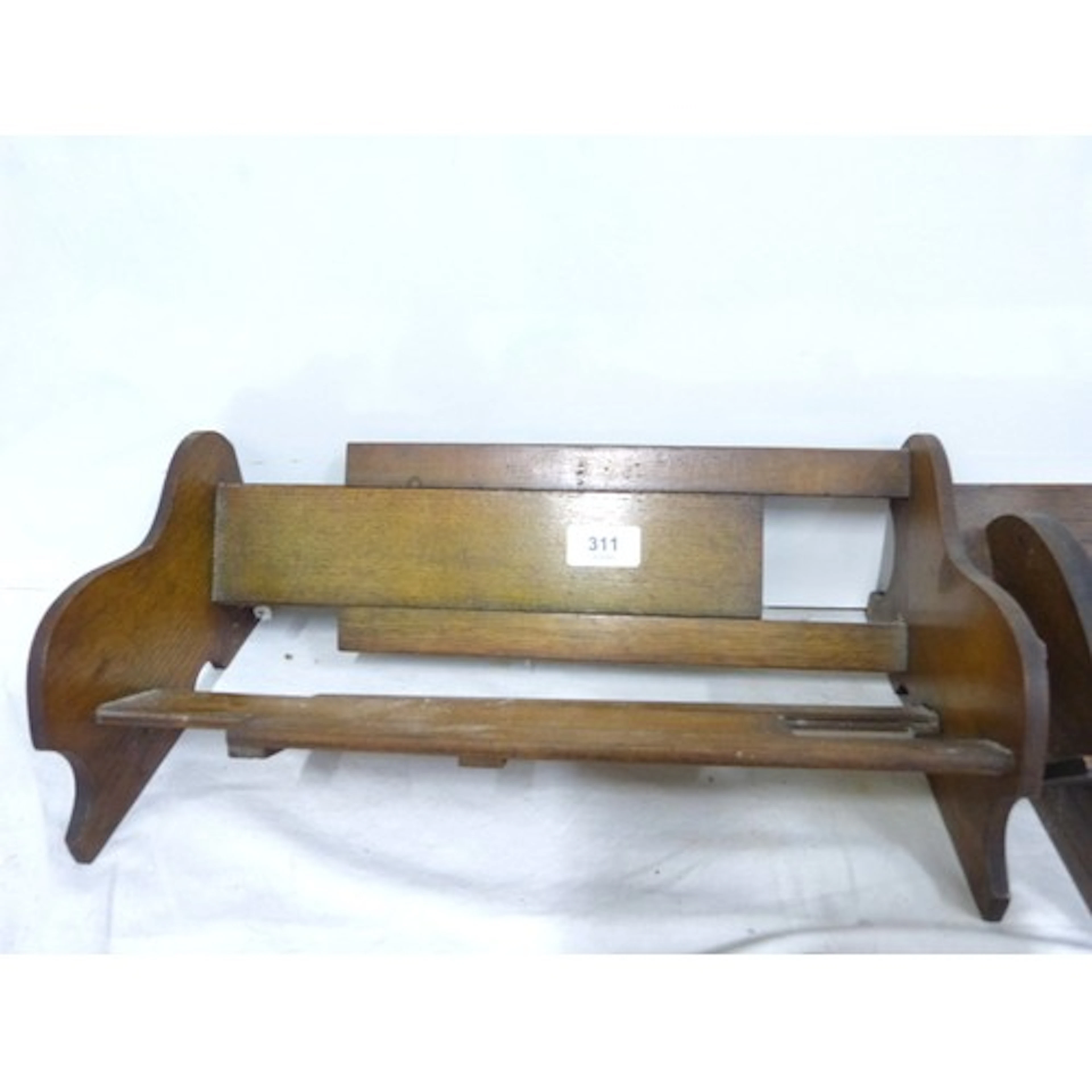 Two small table top book troughs.