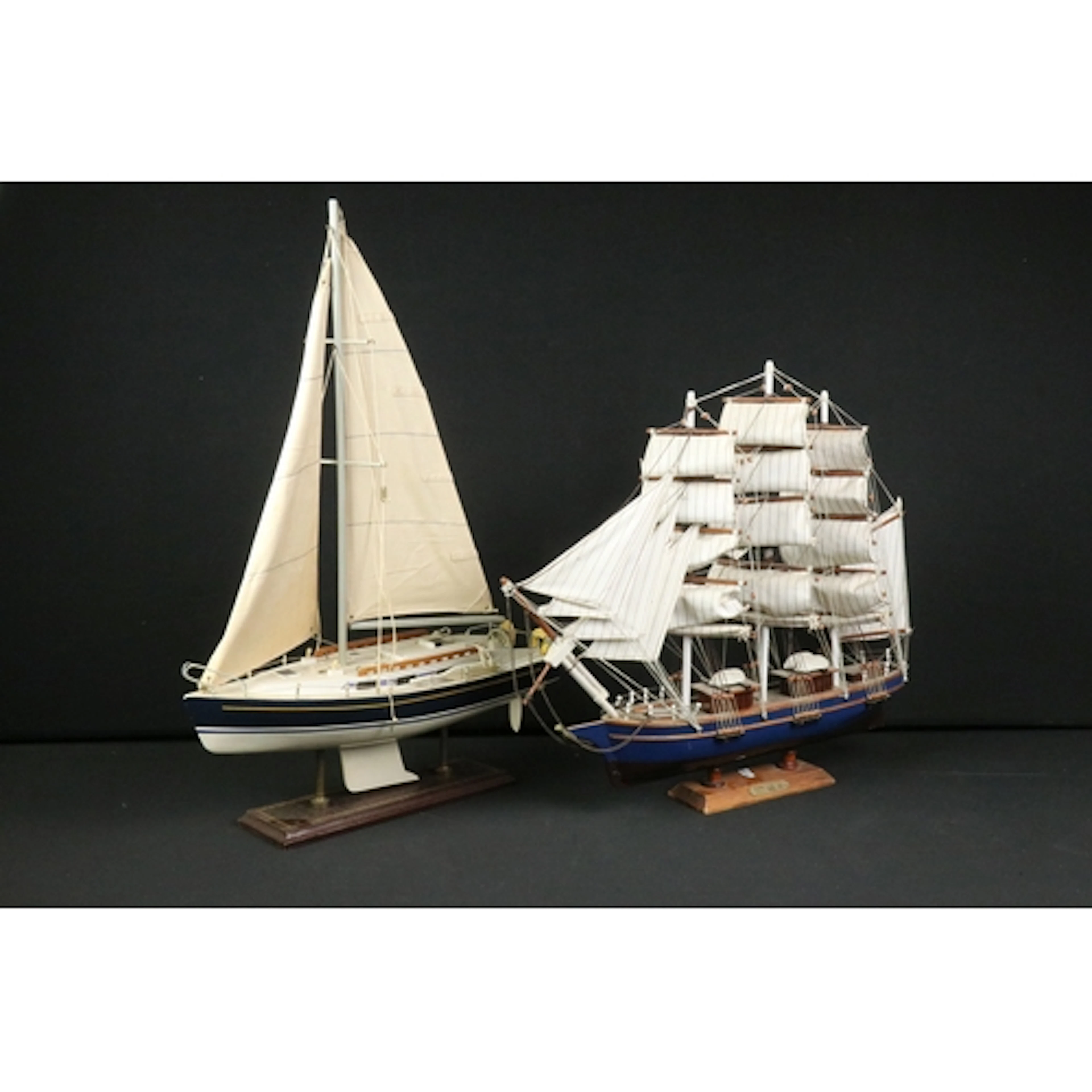 Model of a three-mast tall ship, raised on plinth base, toge...