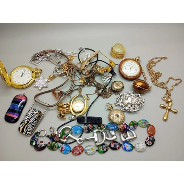 A collection of costume jewellery and pendant watches, inclu...