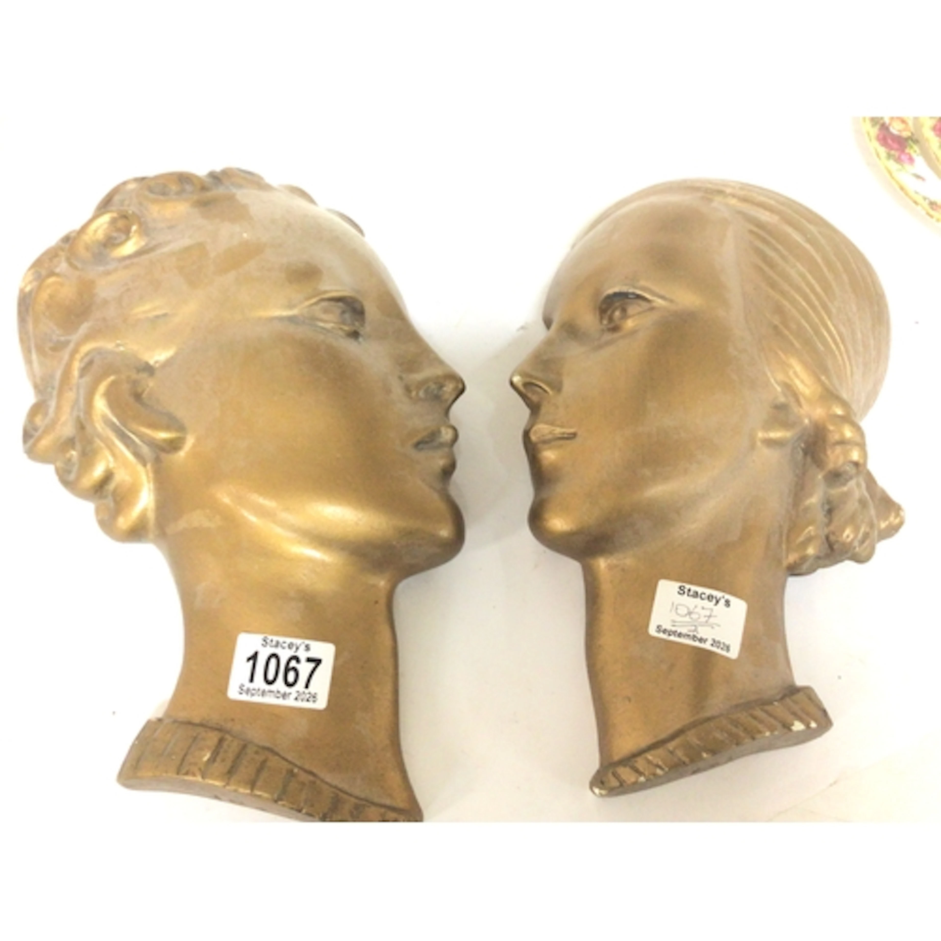 Two Art Deco influence gold painted wall masks 31cm